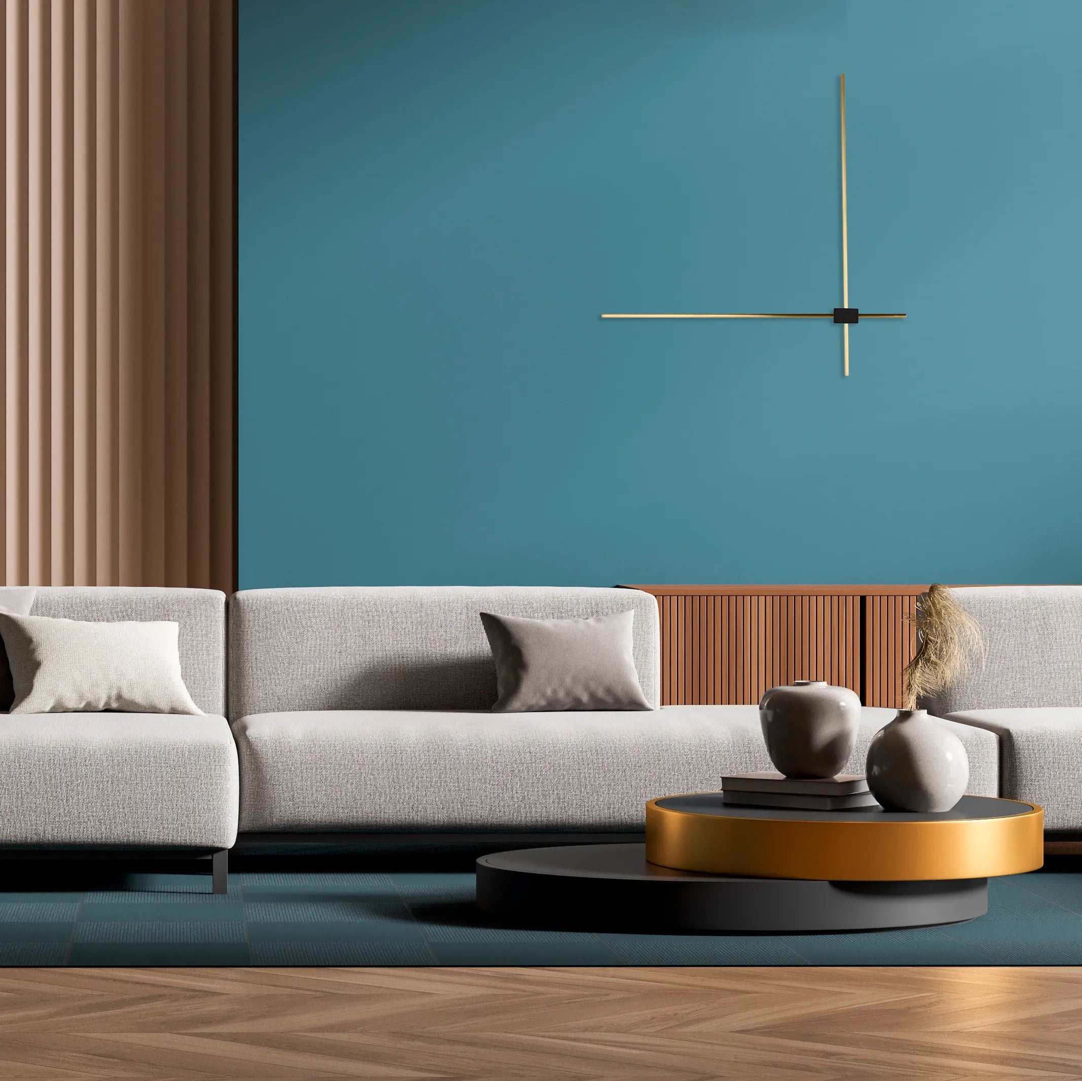 Contemporary wall lighting fixture with a gold finish on a teal wall, illuminating the modern lounge setting.