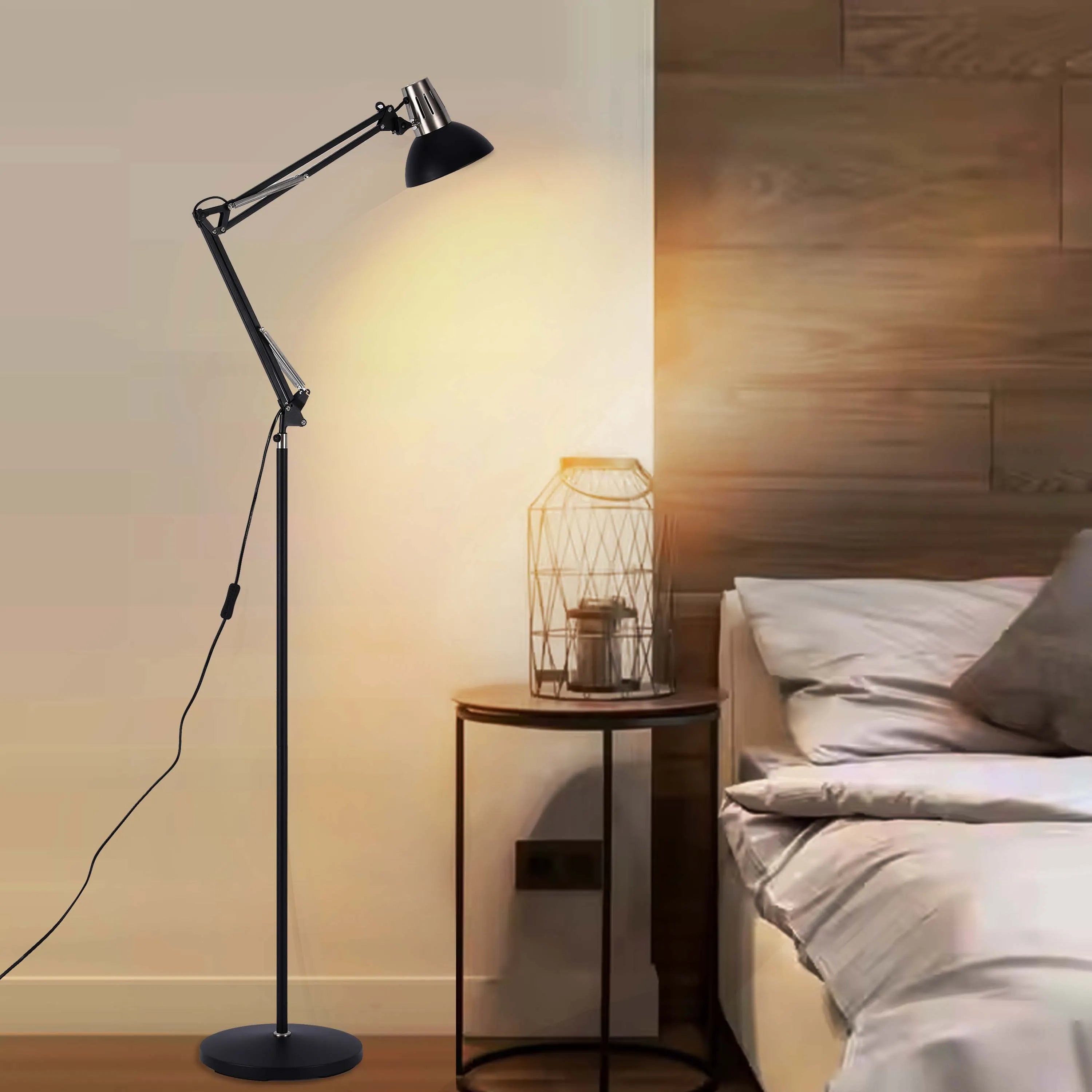 A modern, adjustable floor lamp illuminates a bedroom. The soft light creates a warm, inviting atmosphere.