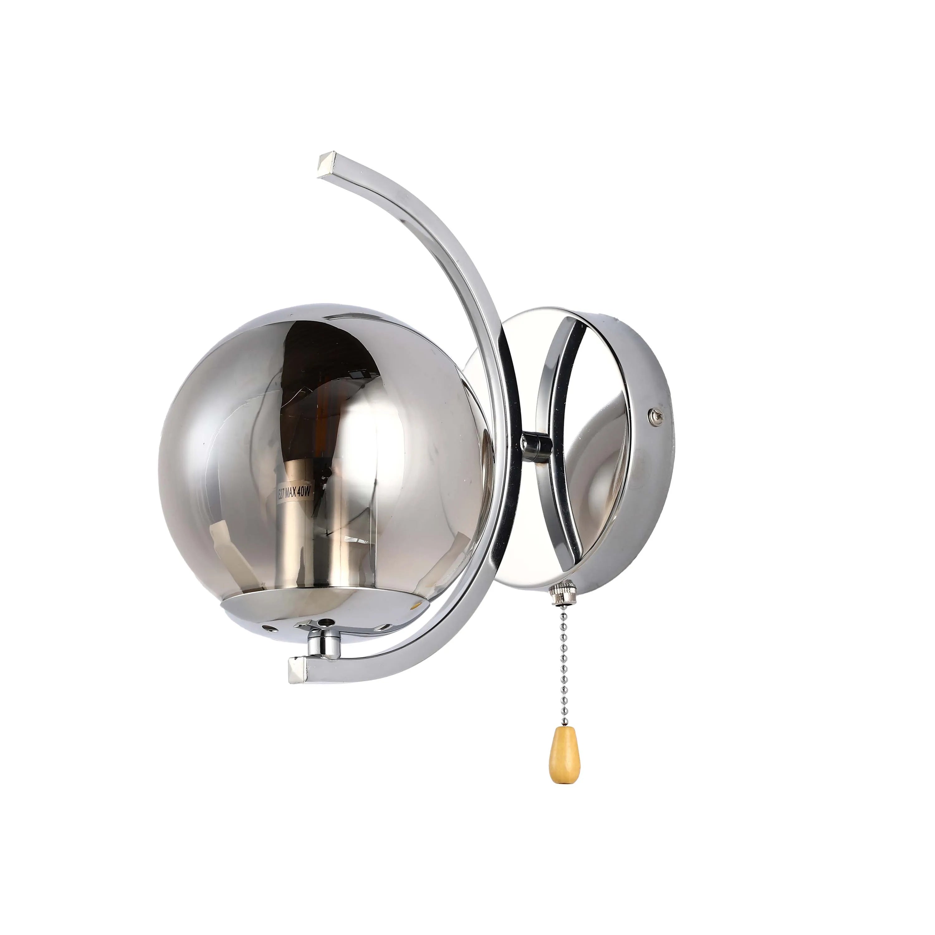 Chrome wall light with smokey glass globe shade and a pull cord. Modern, sleek, and ideal for adding a touch of class to any room.