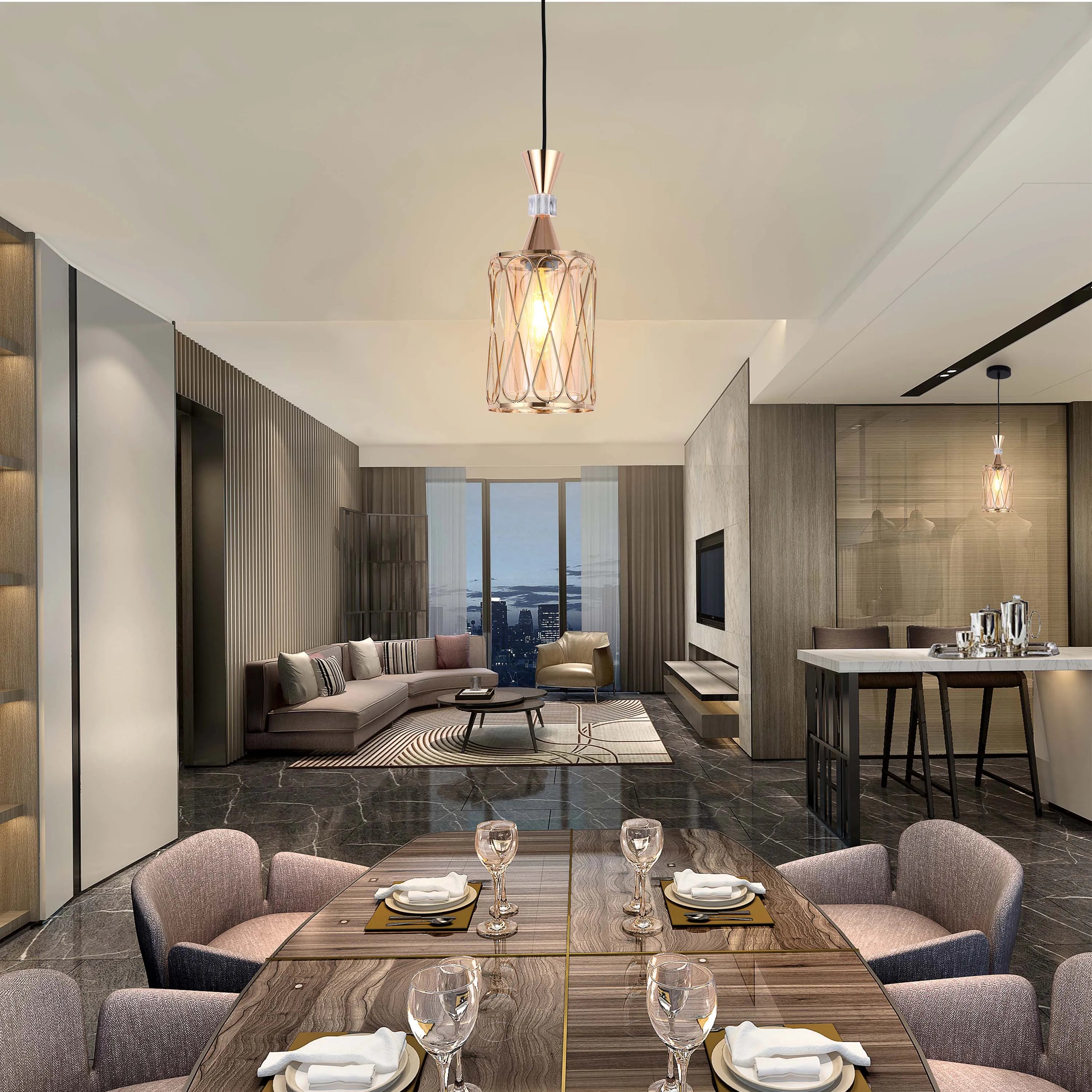 A modern dining room features pendant lighting above the dining table and breakfast bar, creating a warm and inviting atmosphere.