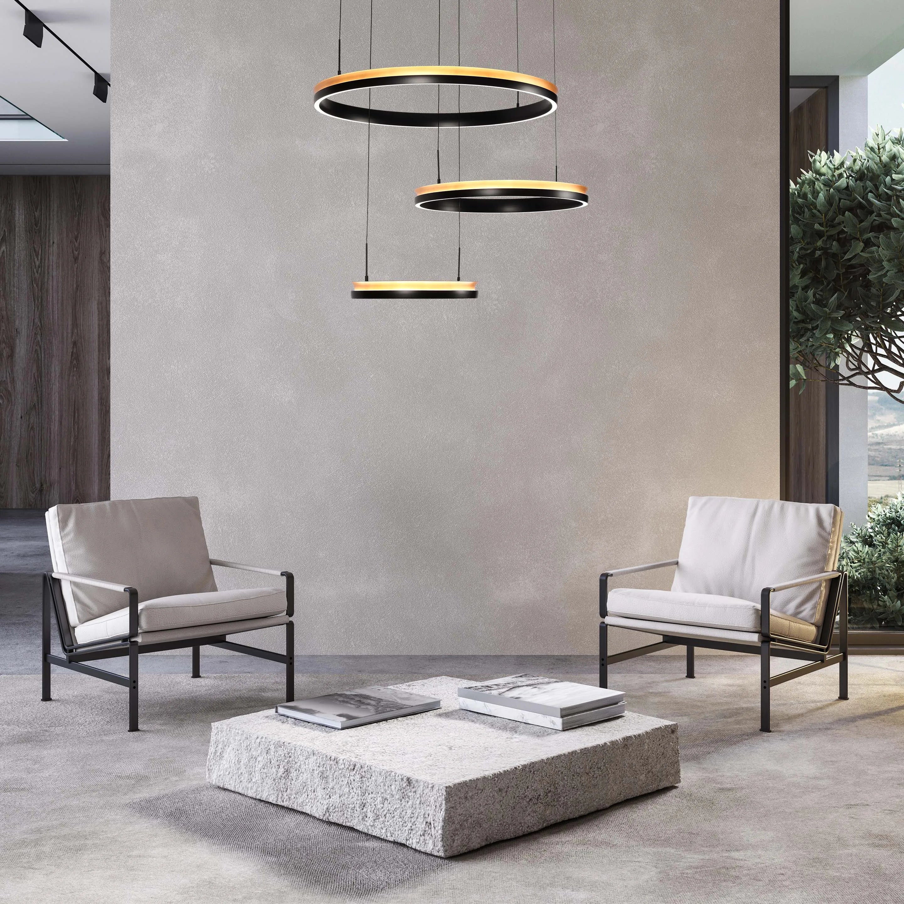 Contemporary room with stylish, circular pendant lights in black and wood finish, suspended above a stone coffee table.