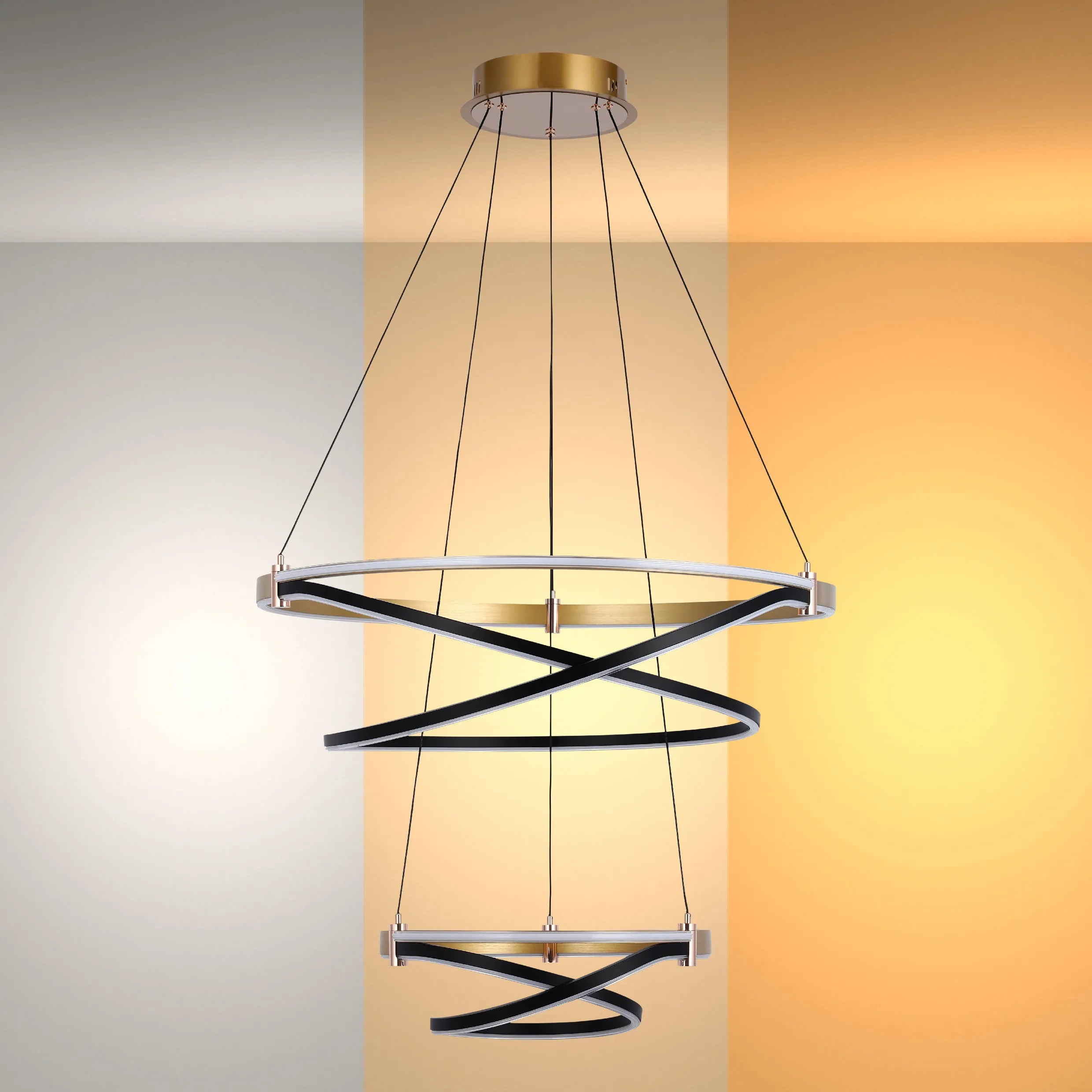 A modern, two-tier LED chandelier with black accents and a warm, diffused glow, suspended from a golden ceiling rose.