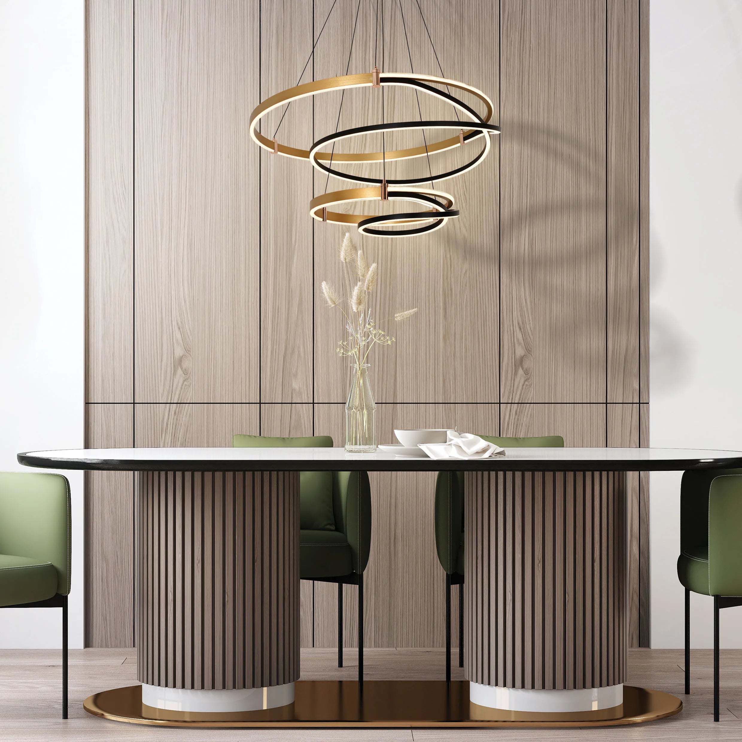 A modern, halo-style pendant light with gold and black rings, above a stylish dining table, provides ambient illumination.