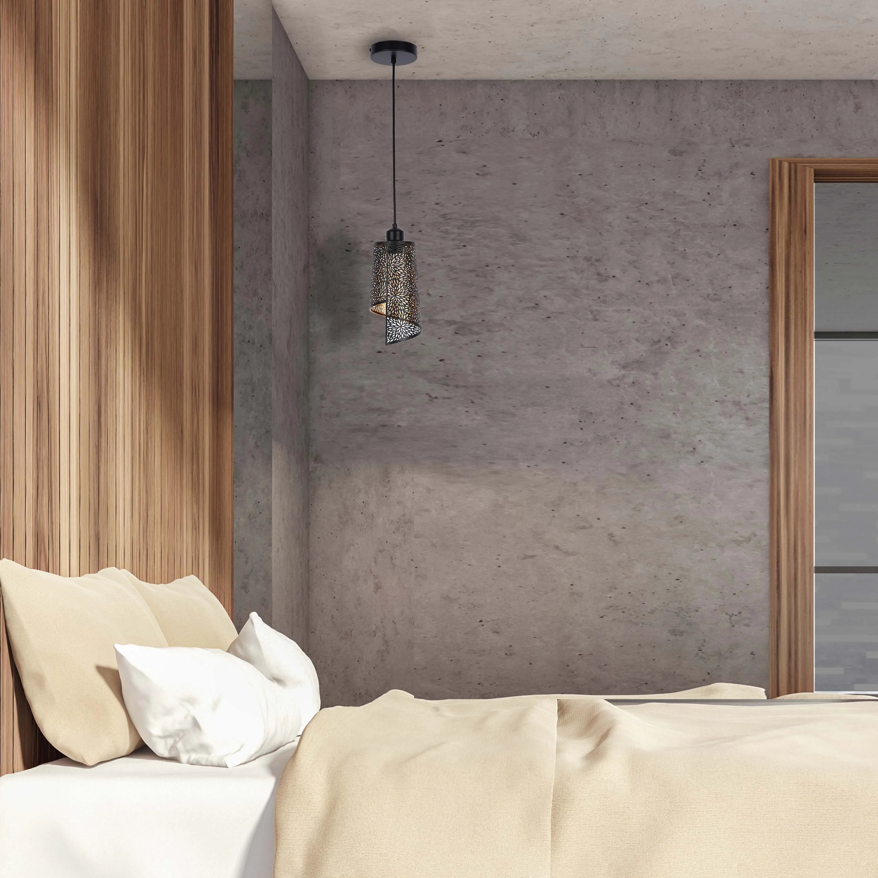 A metal pendant light hangs from the ceiling, casting a warm glow. Natural light filters in from the side.