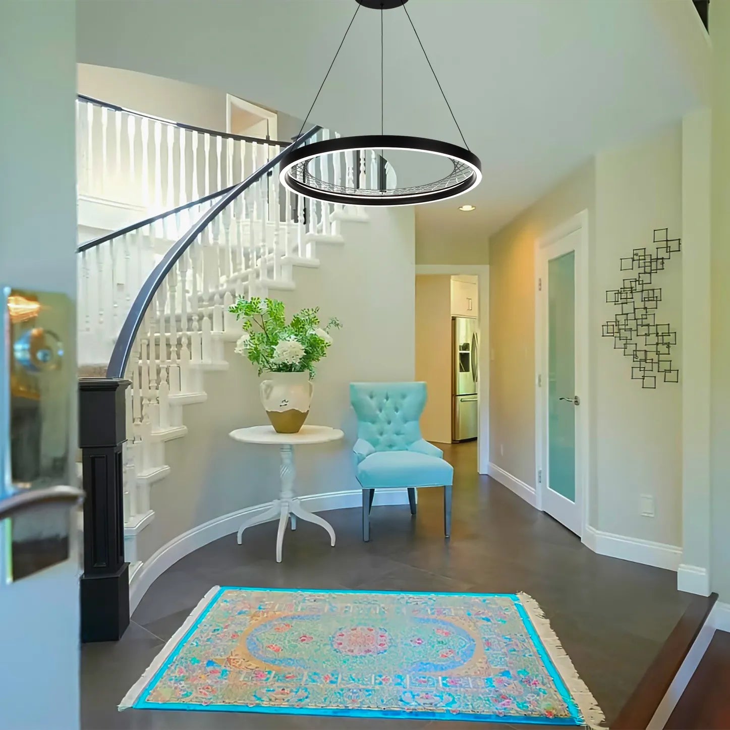 A sleek, modern ring pendant light hangs above a stylish hallway. Its circular design adds a contemporary touch to the space.