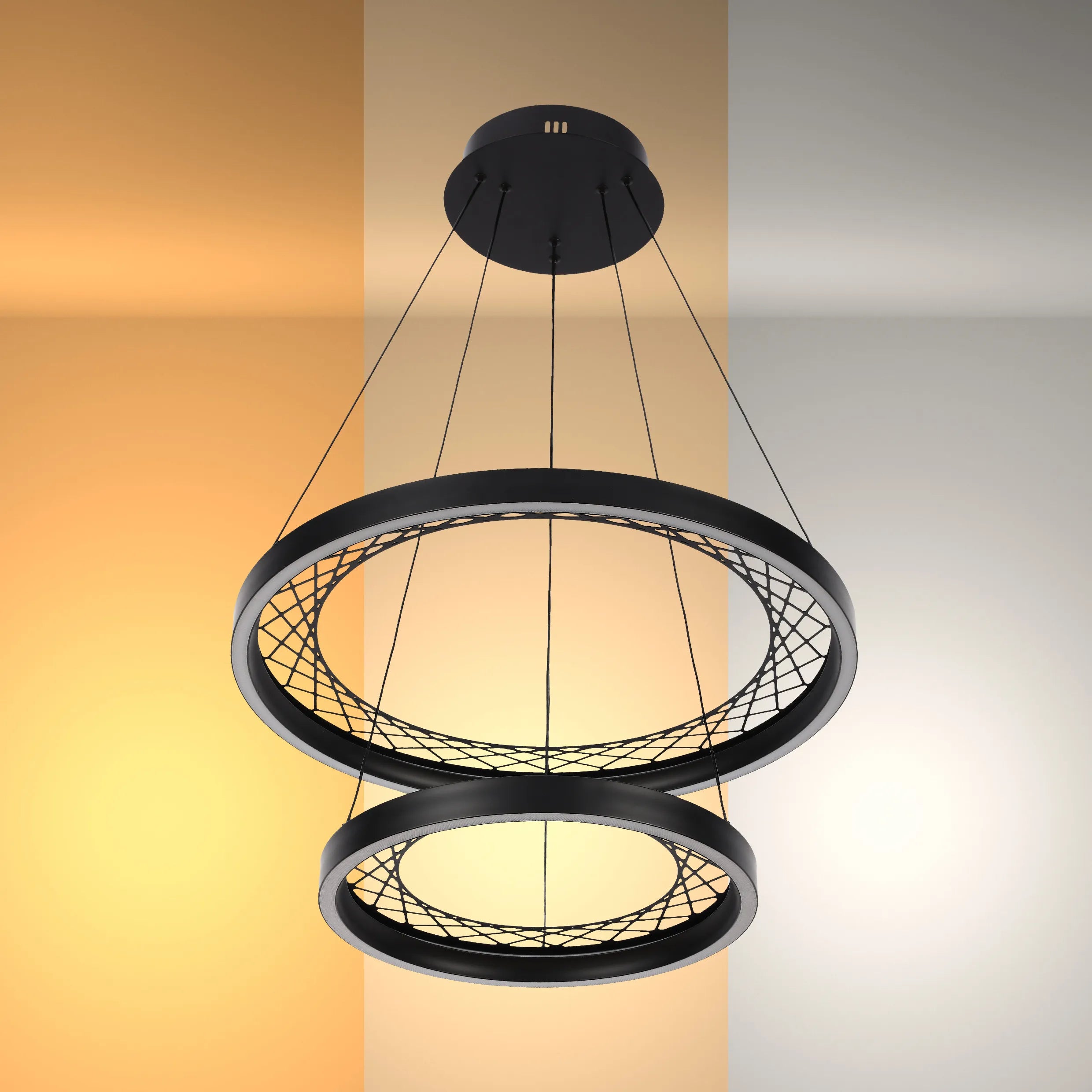 A modern, two-tiered ring light fixture hangs elegantly, casting a warm glow against a graduated backdrop.