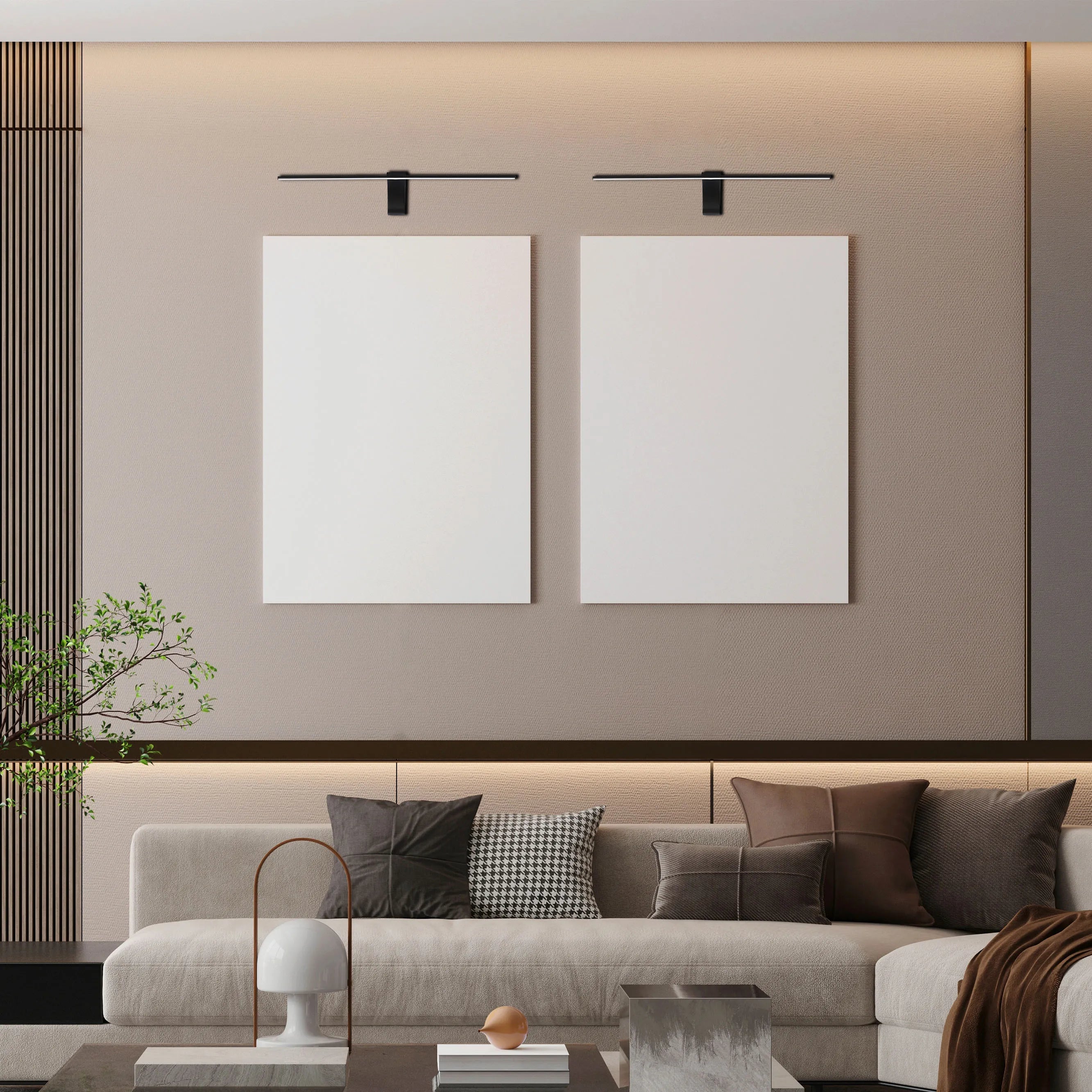 Wall-mounted picture lights illuminate two blank canvases above a plush sofa, creating a warm, inviting ambience.