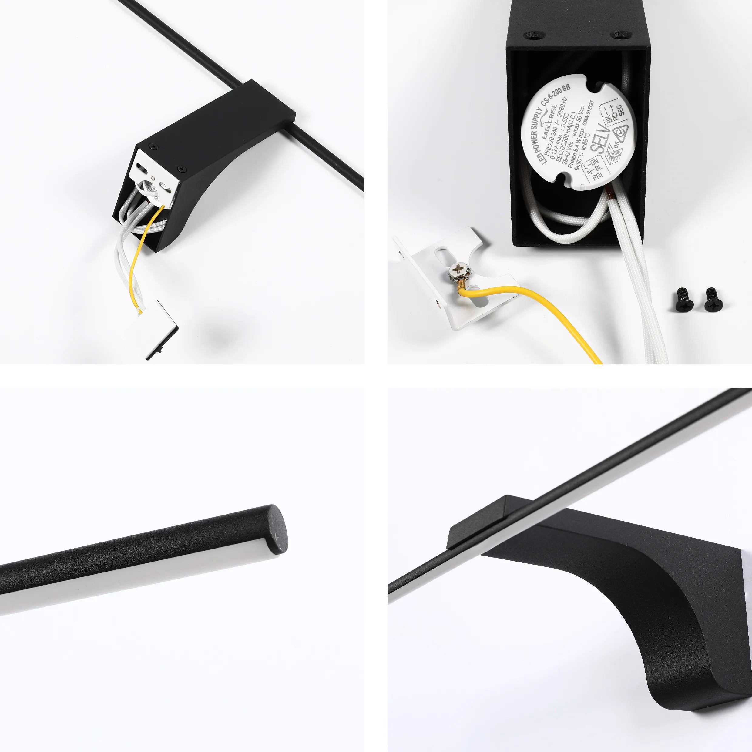 Modern black wall light installation with linear design, wiring detail and power supply visible.