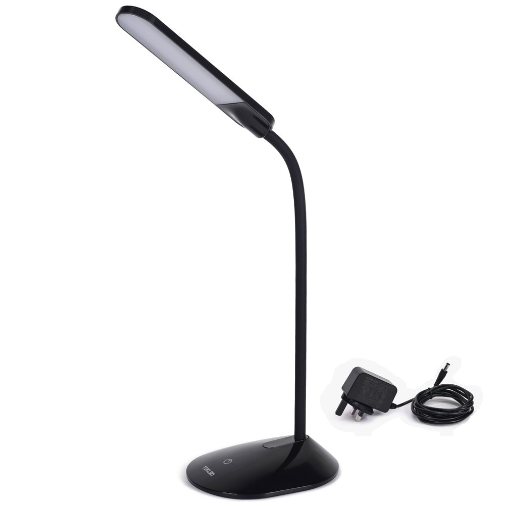 A sleek black desk lamp with a flexible neck and LED light panel, accompanied by its power adapter.
