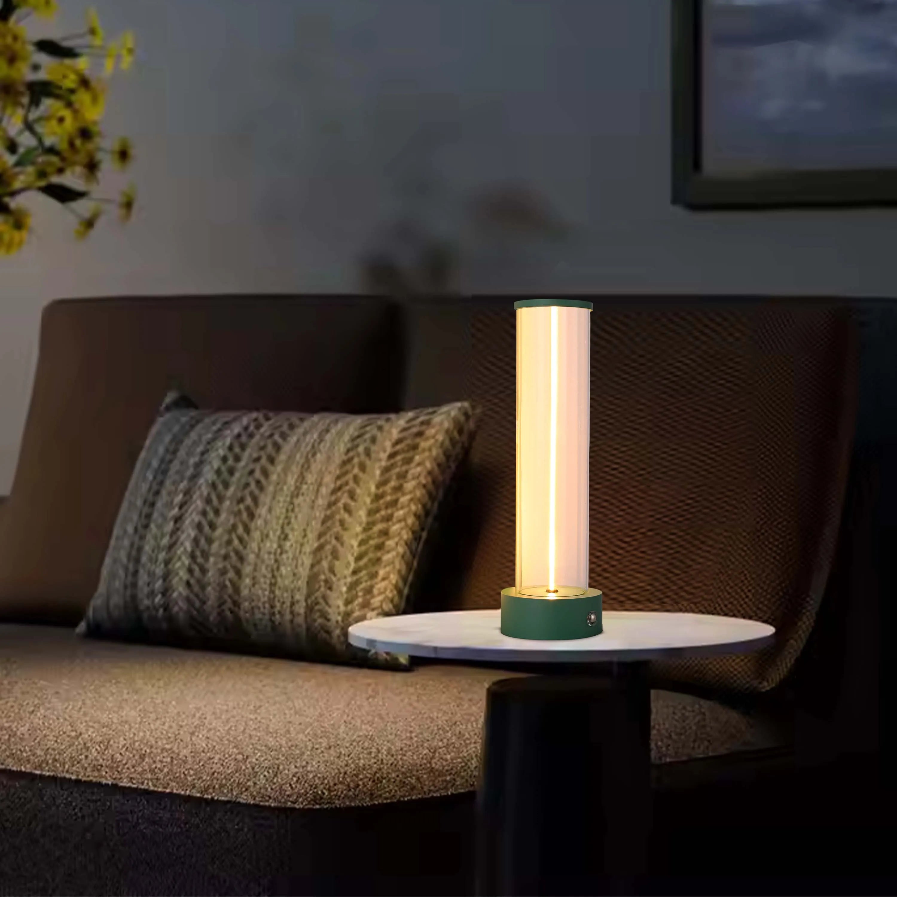 Ambient lighting from a bedside lamp creates a warm, inviting atmosphere in this cosy, dimly lit room.