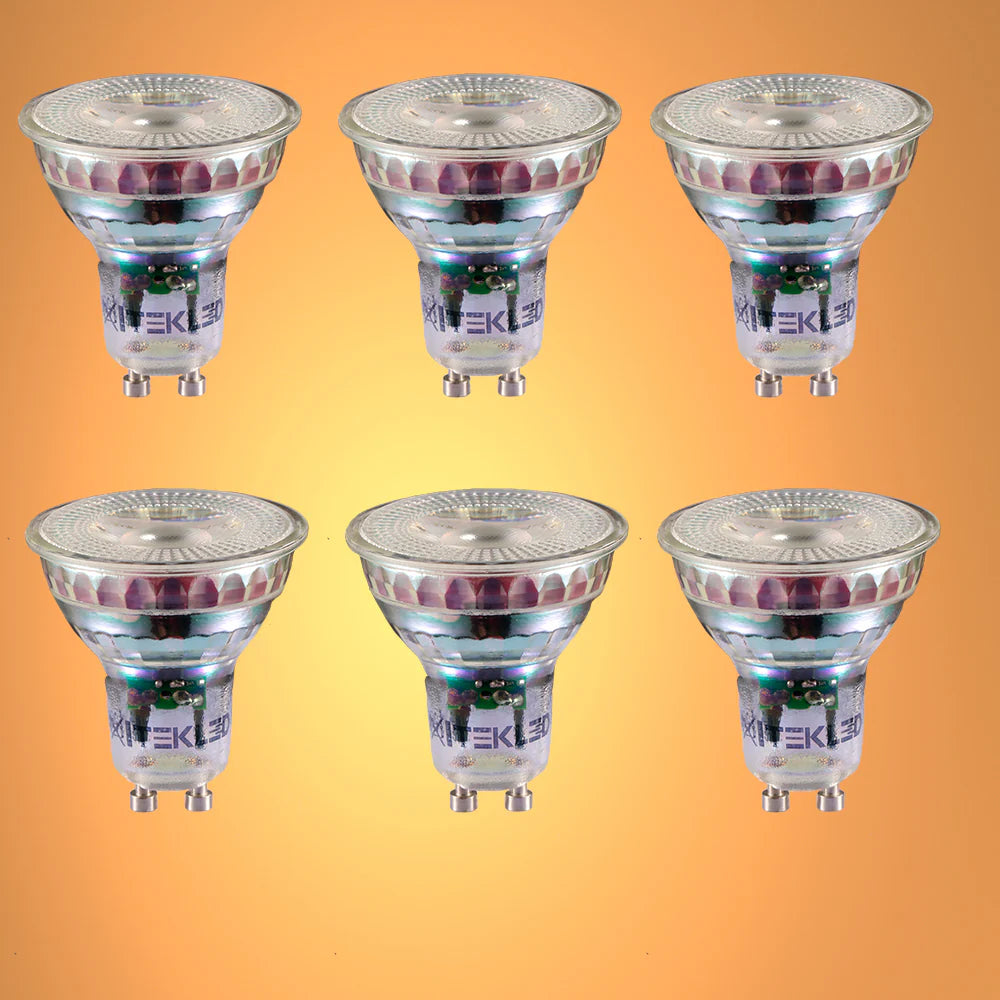 Six LED spot lights, arranged in a 2x3 grid against a warm orange background, ideal for energy efficient lighting.