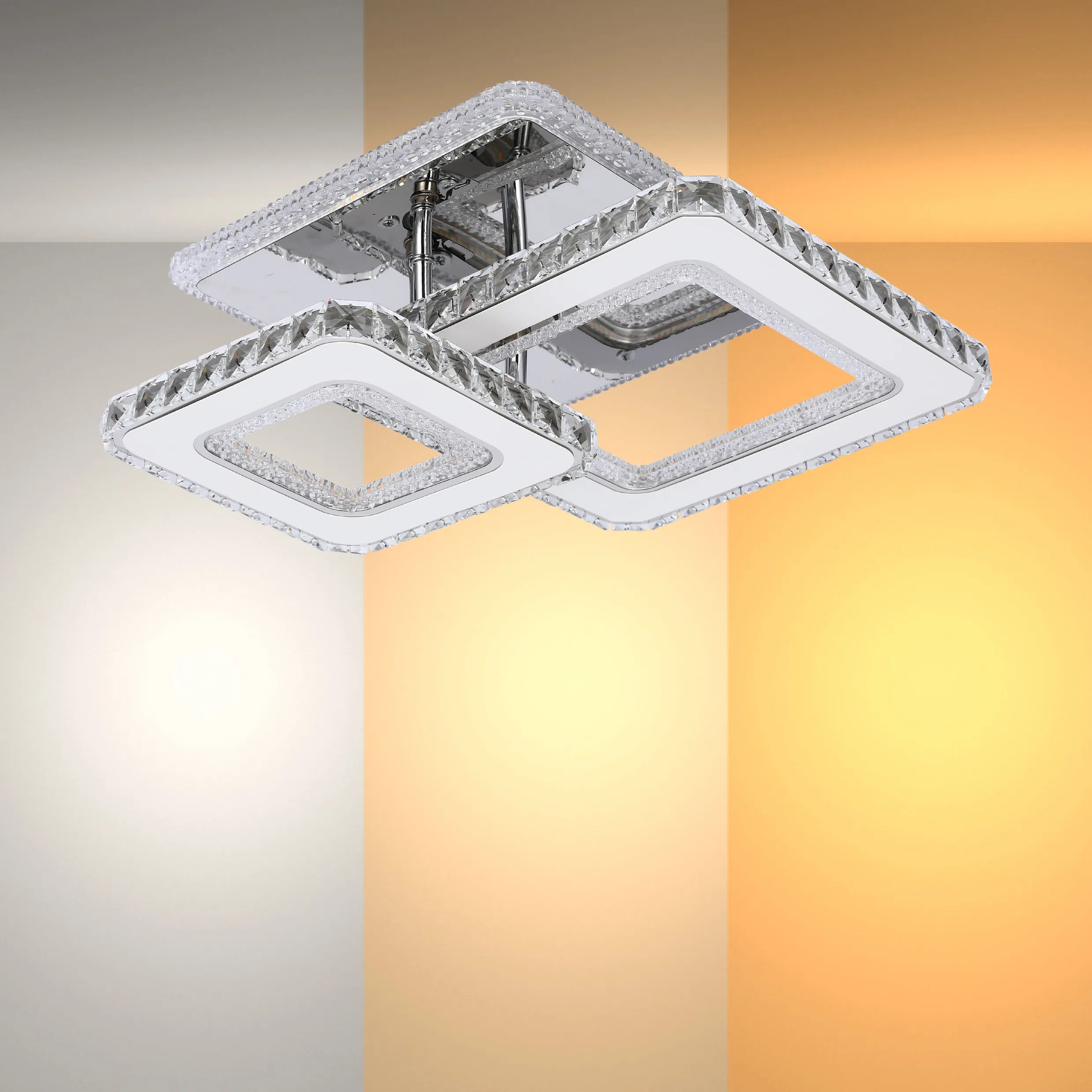 A contemporary ceiling light fixture with a chrome finish and crystal detailing in an abstract, geometric design.