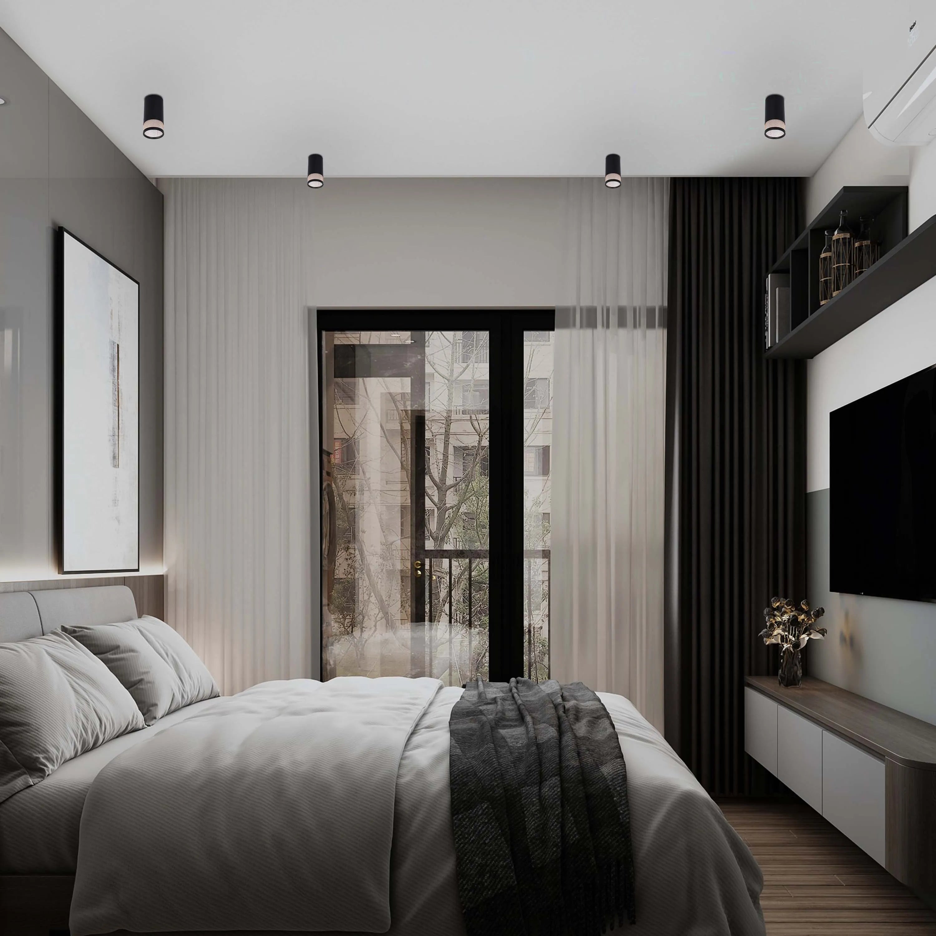 Modern bedroom lighting with recessed ceiling spotlights, creating a bright and inviting atmosphere for relaxing or sleeping.