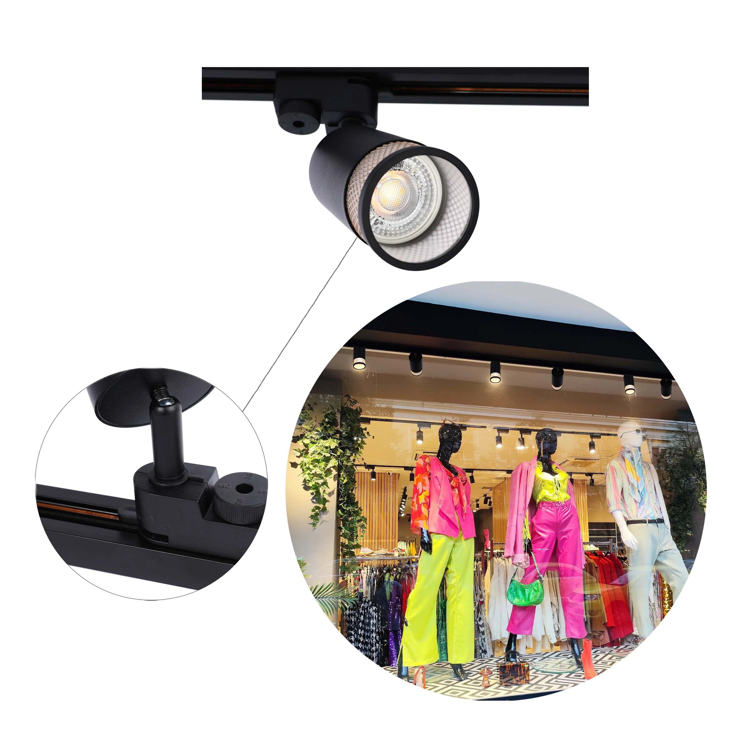 Track lighting illuminates a shop window display, showcasing vibrant, modern clothing on mannequins.