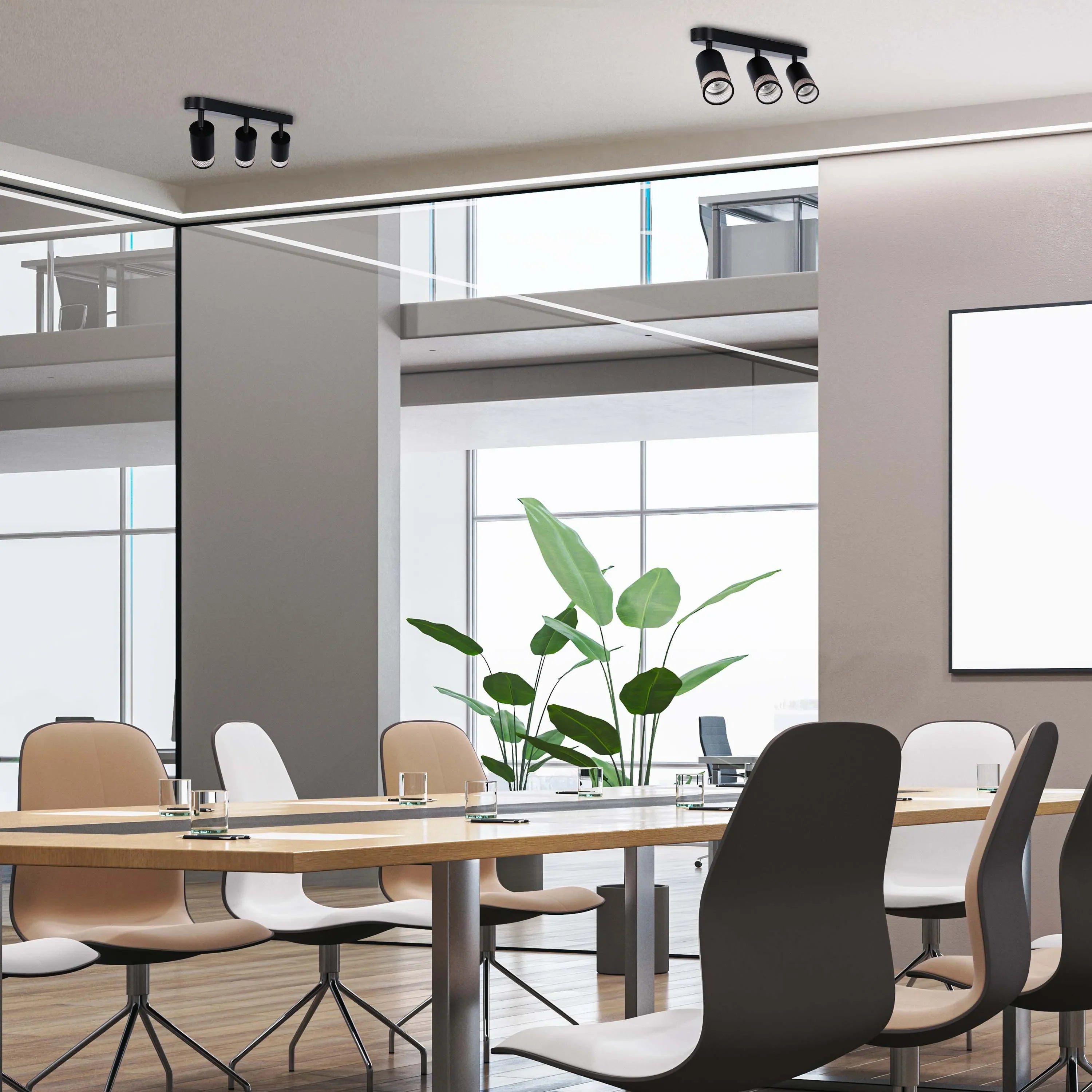 Modern office lighting with track spotlights. Bright, adjustable LEDs enhance the workspace ambiance and highlight key areas.