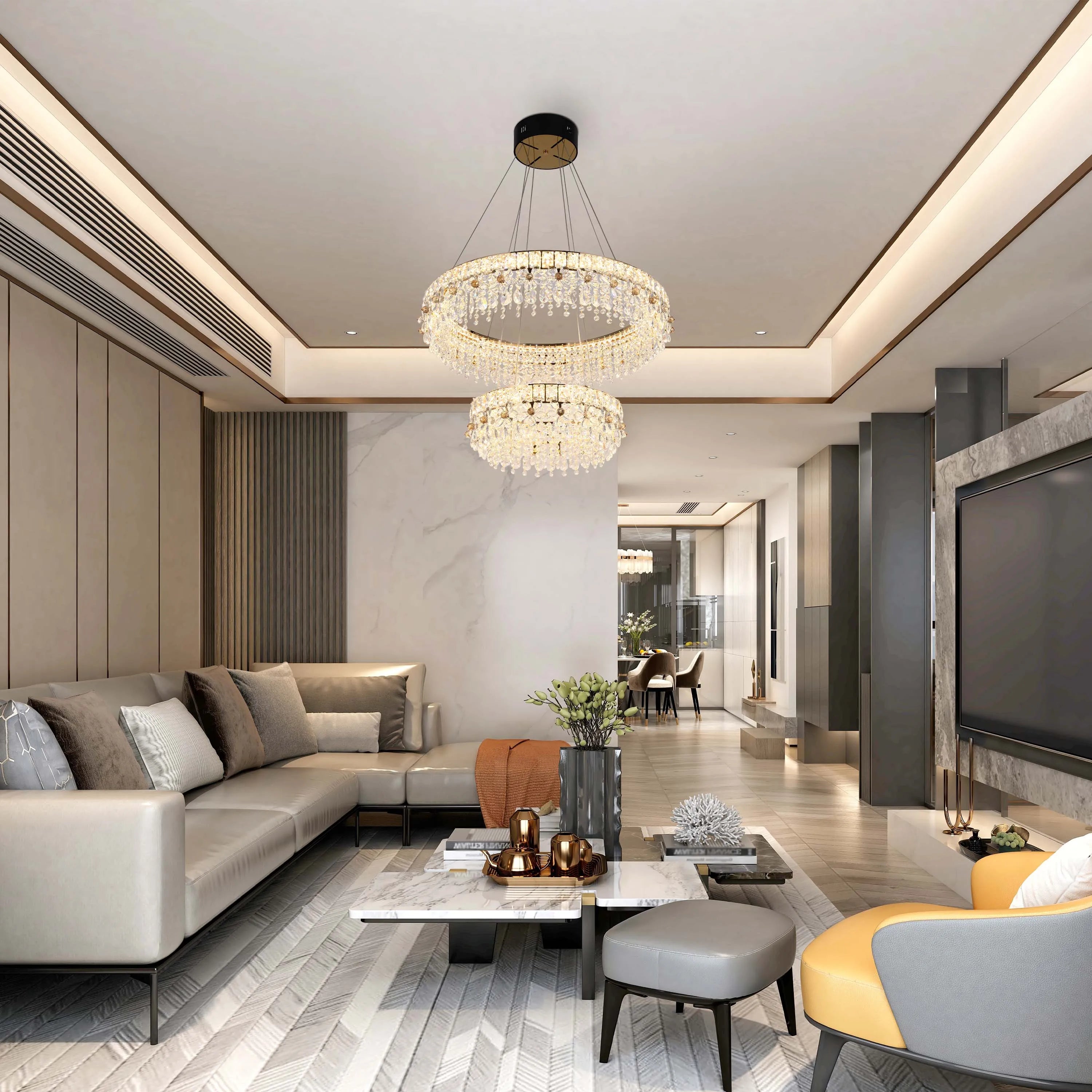 Stunning living room featuring a two-tier crystal chandelier, casting a warm glow over the stylish interior.