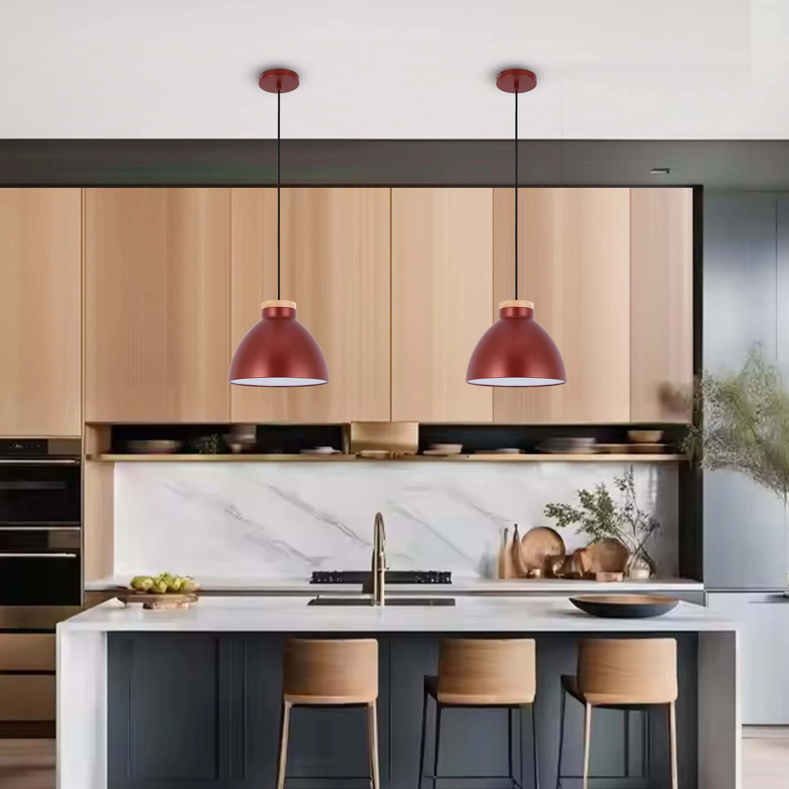 Two copper pendant lights hang above a kitchen island, adding a touch of modern elegance to the space.