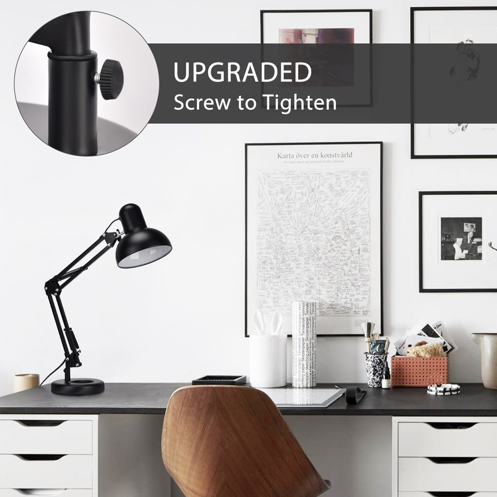A tidy workspace with a black desk lamp, wooden chair, and white drawer units under a dark grey desk top.