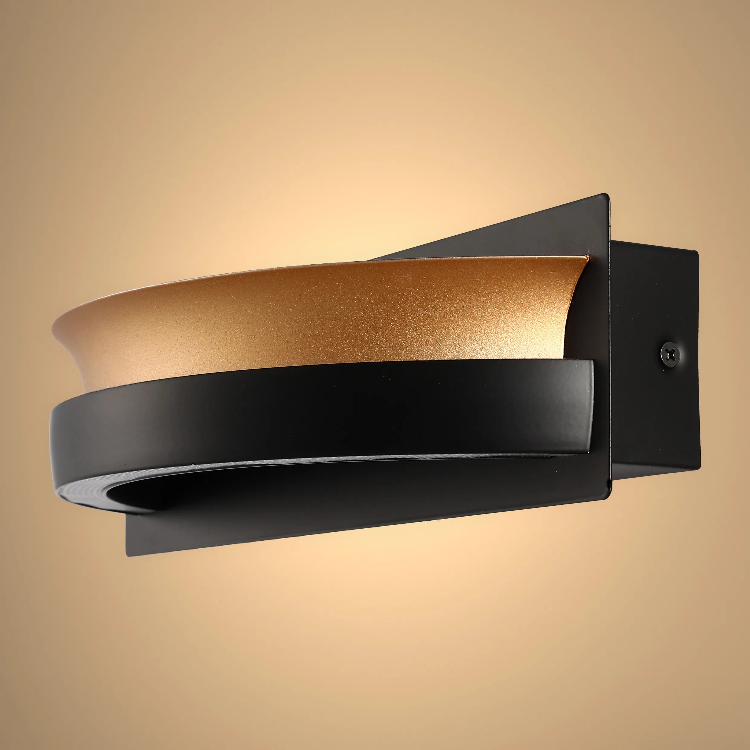 Stylish wall light with a black and gold finish, creating a warm ambient glow. A modern design for a chic interior.