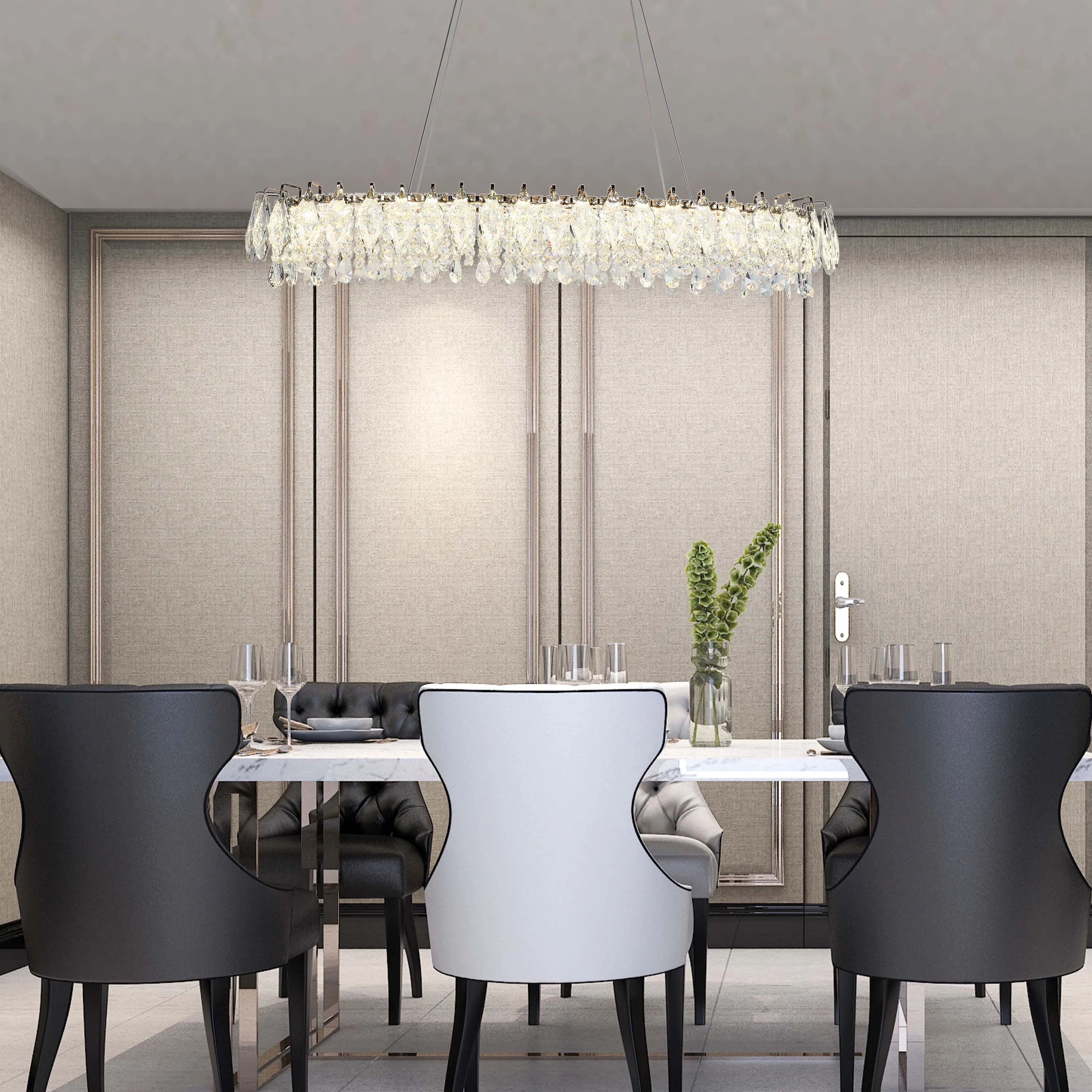 A modern rectangular crystal chandelier hangs above a dining table, adding a touch of elegance to the room.