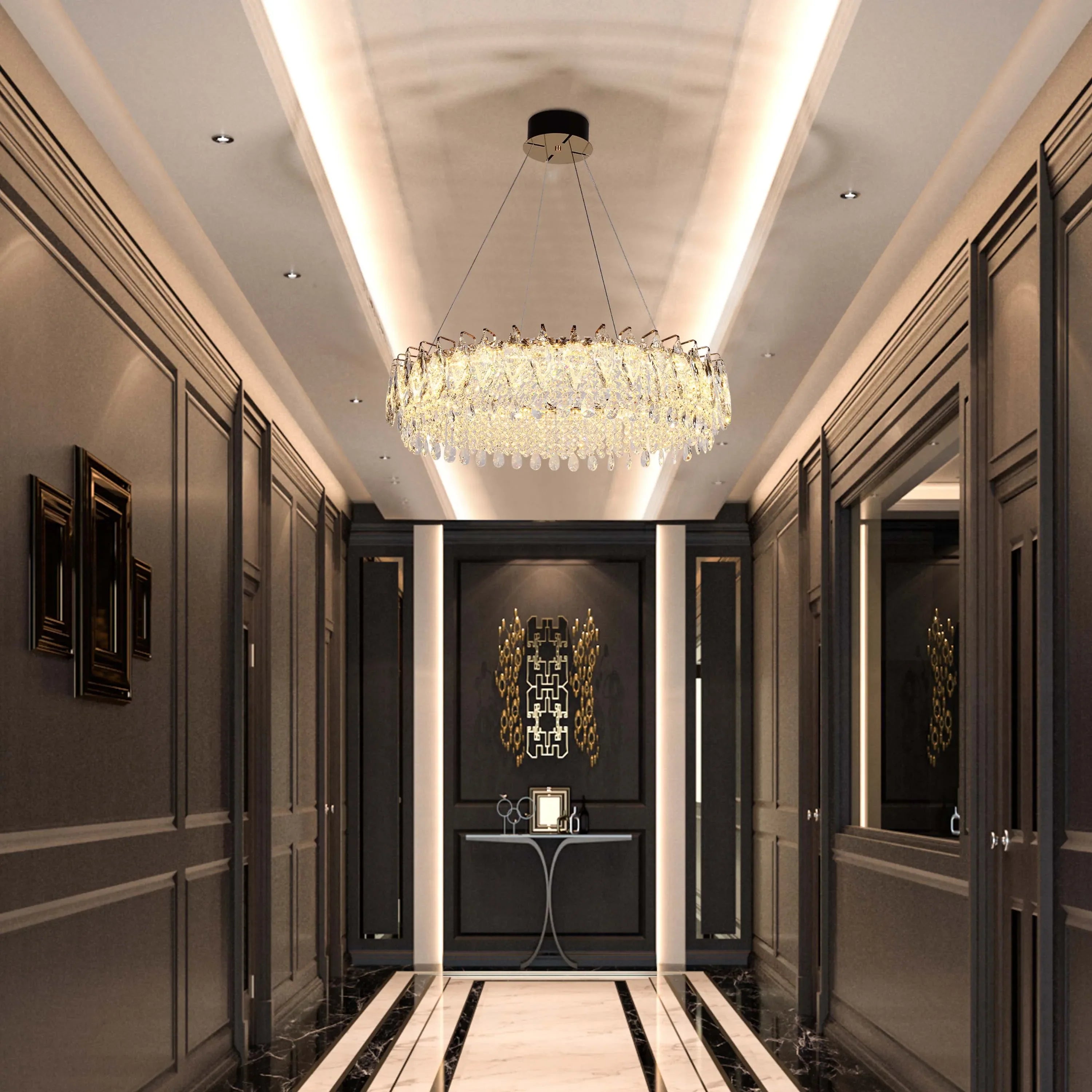 A stunning, modern chandelier illuminates this hallway, enhanced by recessed ceiling spotlights and feature wall lighting.