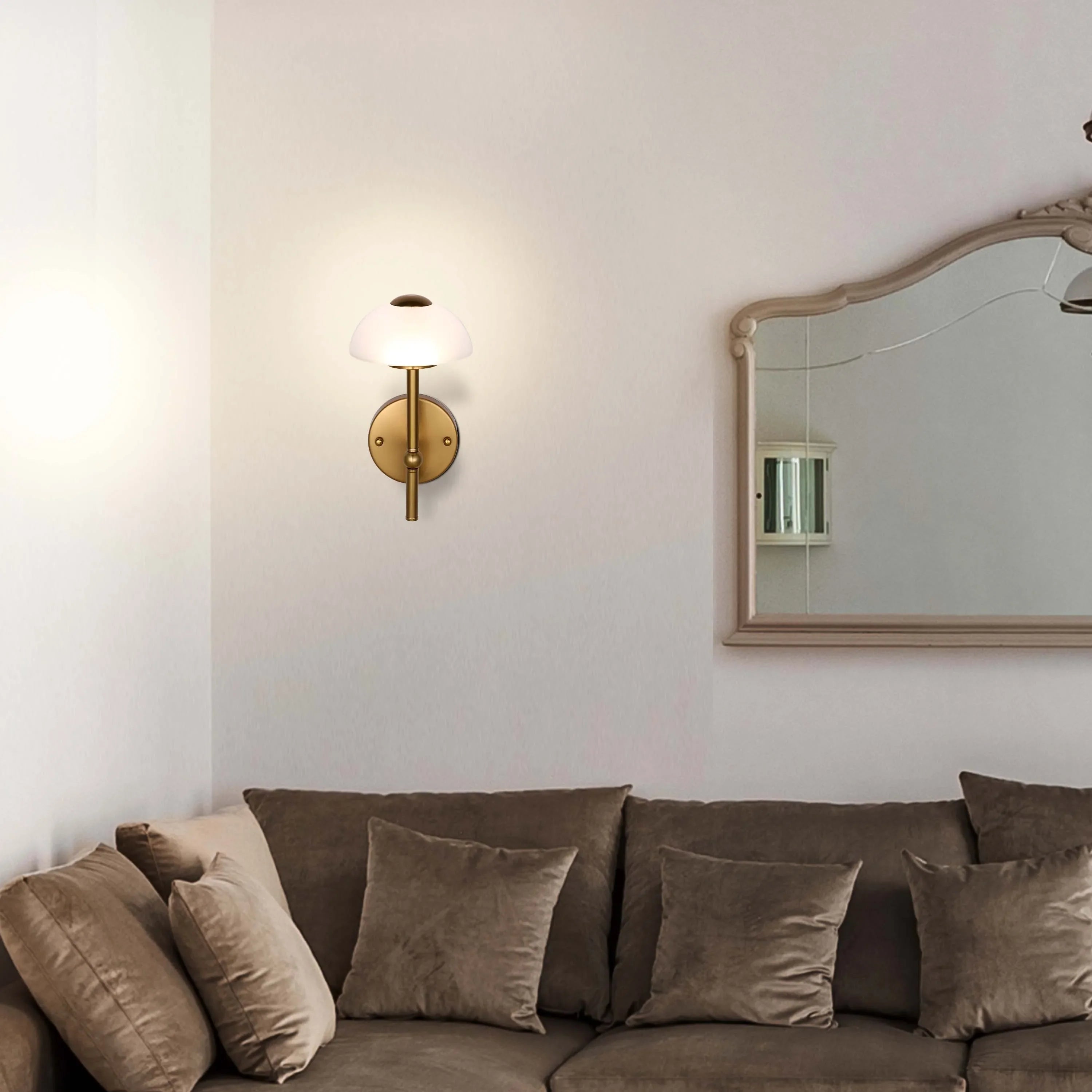 A stylish, warm light casts a glow from the wall lamp, complementing the room's calm ambience.