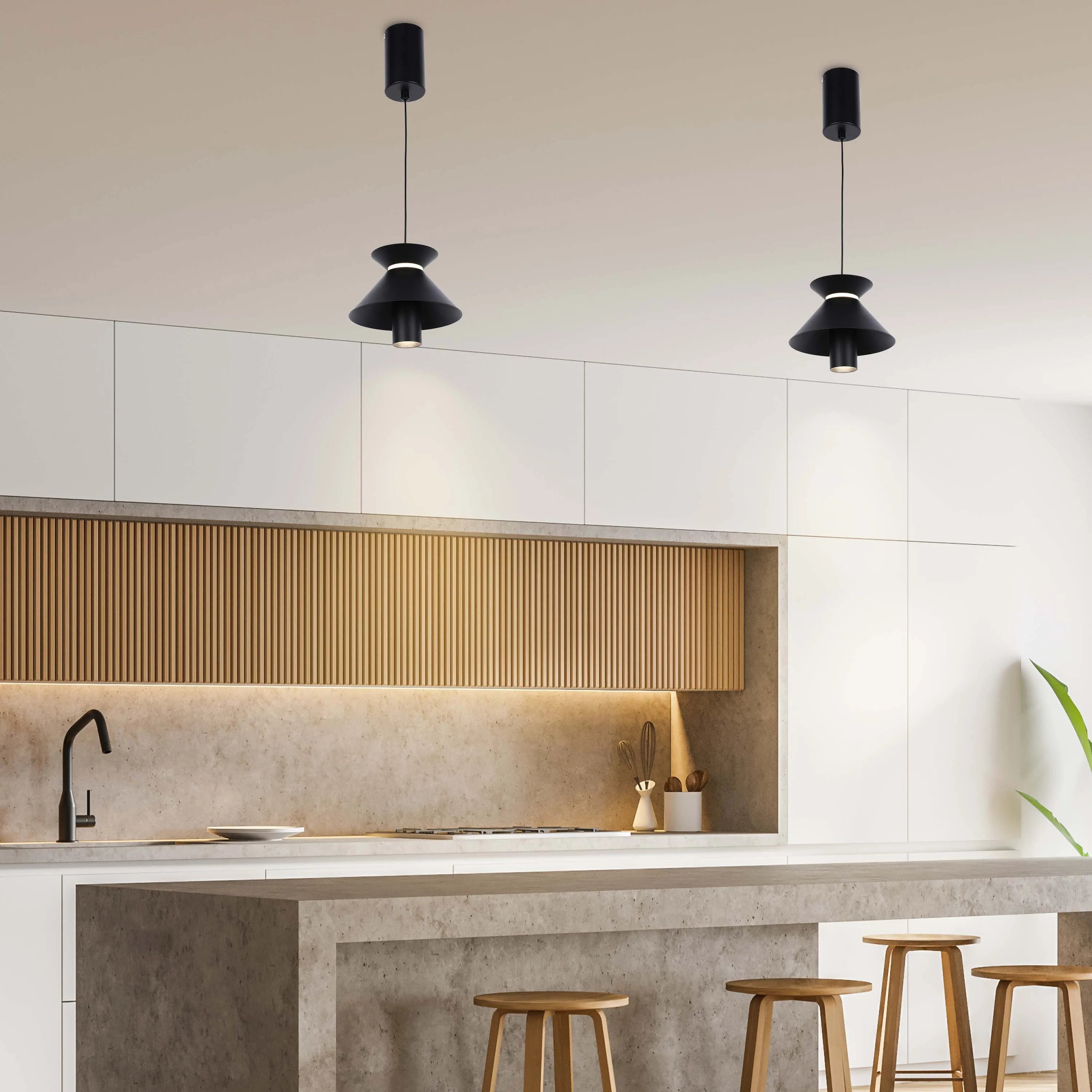 Contemporary kitchen lighting featuring two pendant lights with black shades and spotlights, suspended over a kitchen island.