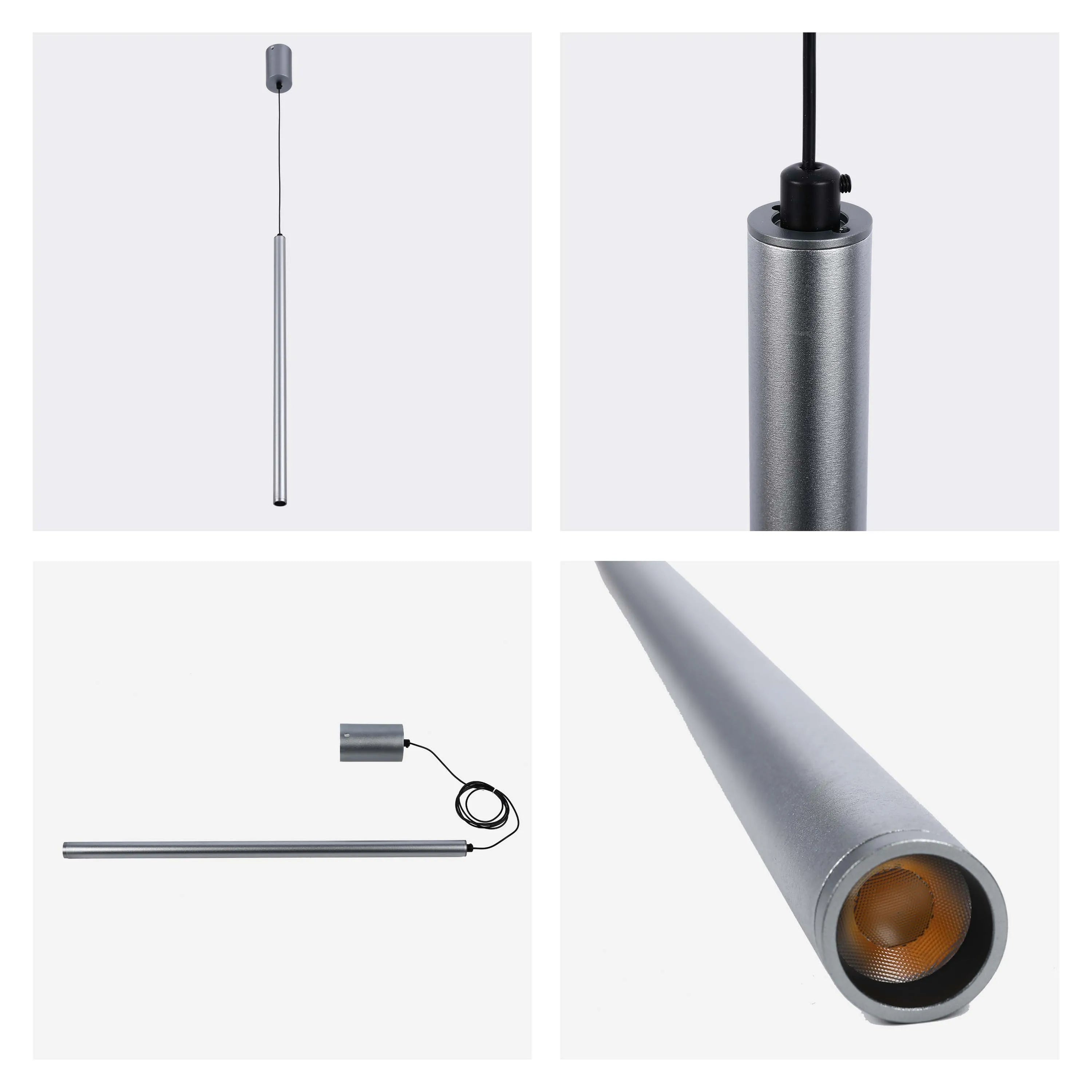 Sleek grey pendant light with a cylindrical design, creating a modern and minimalist lighting solution for any interior.