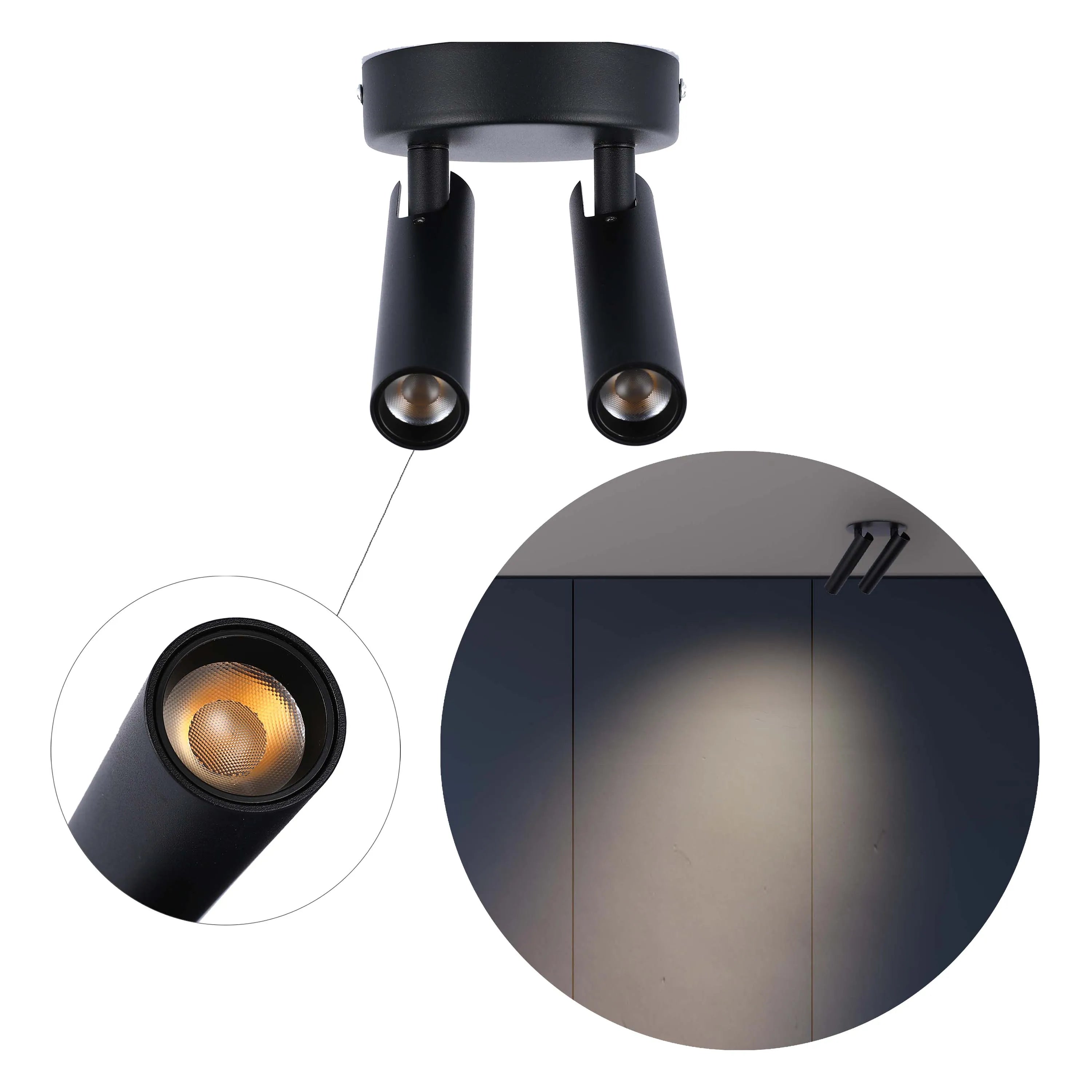 A sleek, modern black spotlight fitting with two adjustable lights, casting a warm glow. Ideal for accent lighting.
