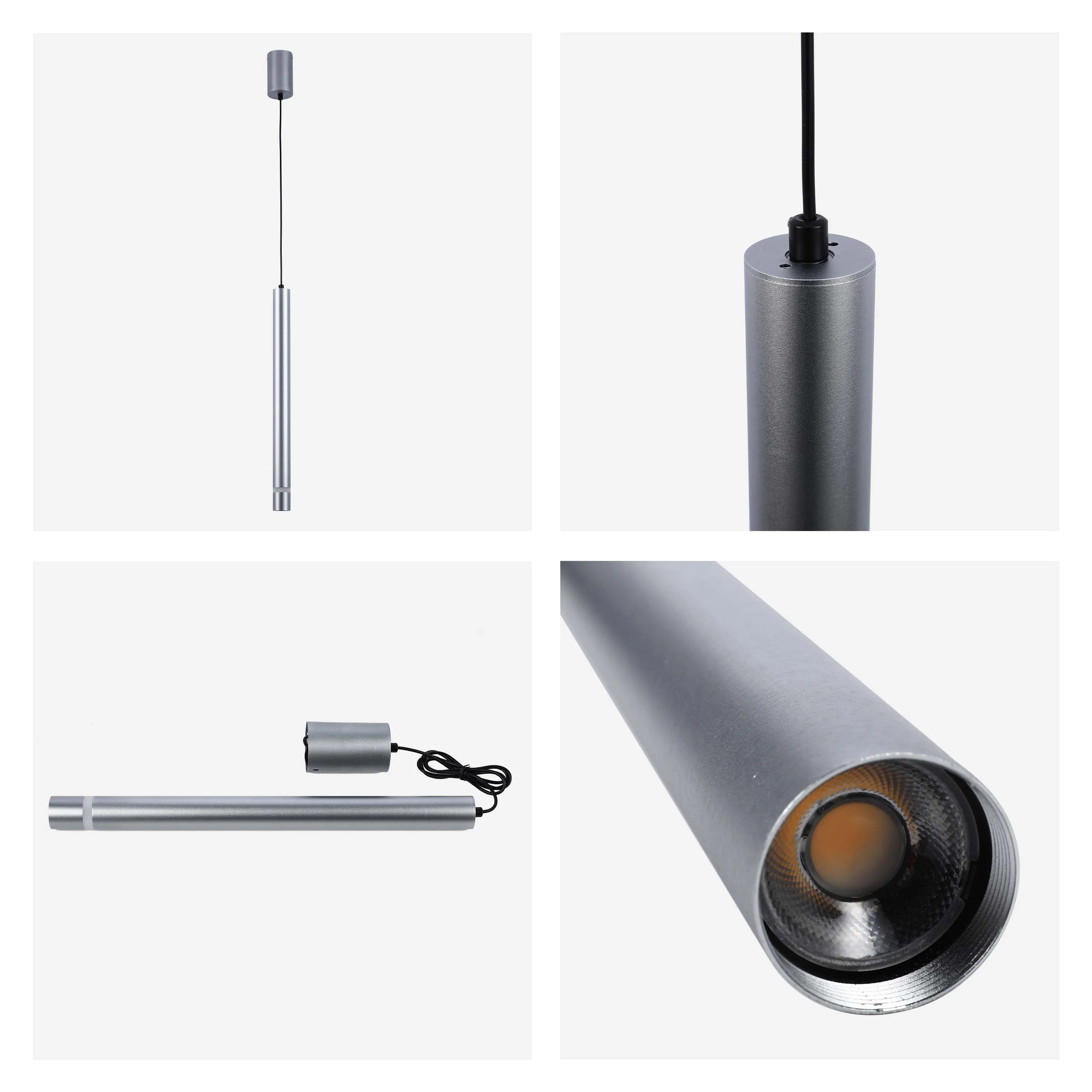 A contemporary silver pendant light, with a sleek cylindrical design. Perfect for modern interiors.