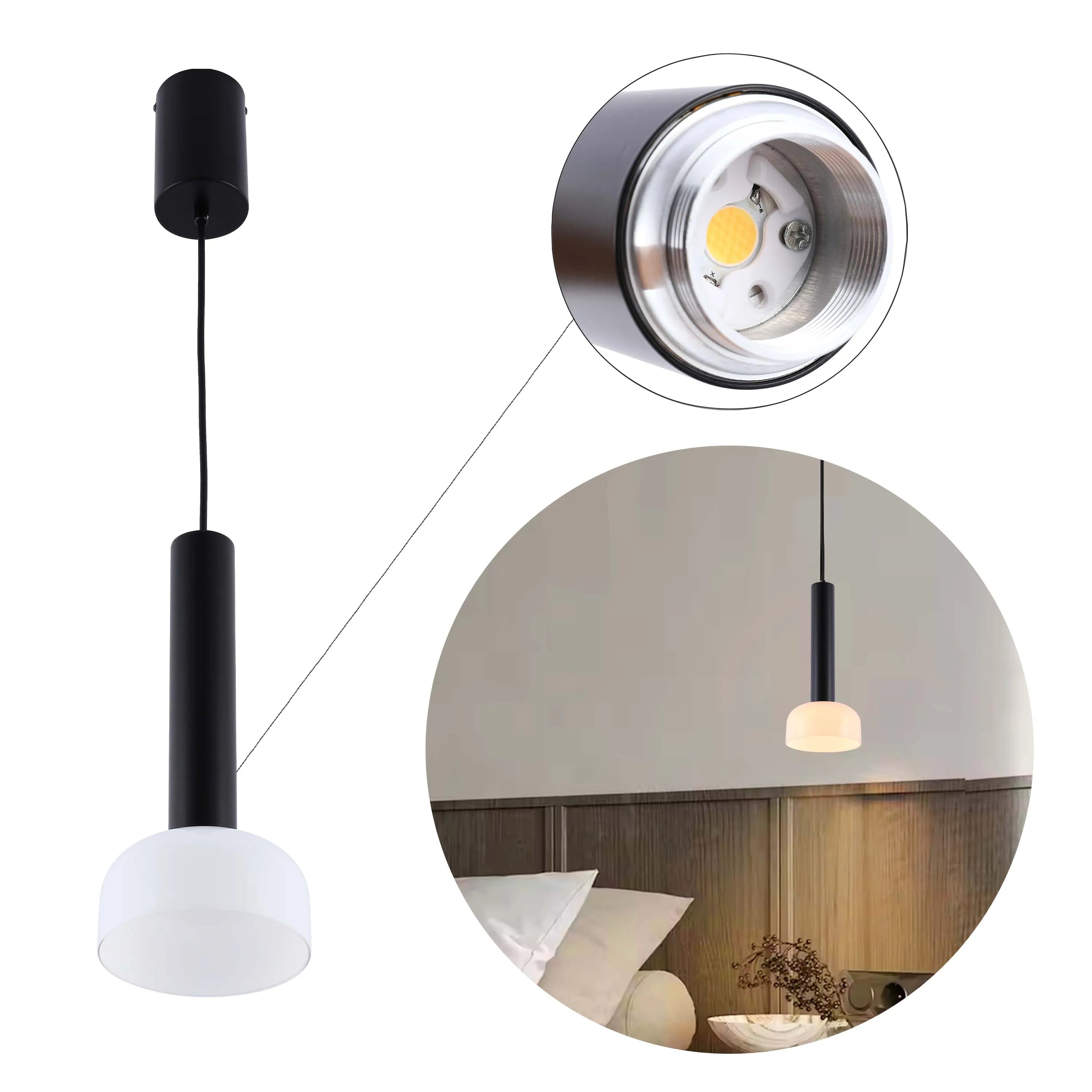 A modern black and white pendant light, featuring a cylindrical design and a bright LED bulb.