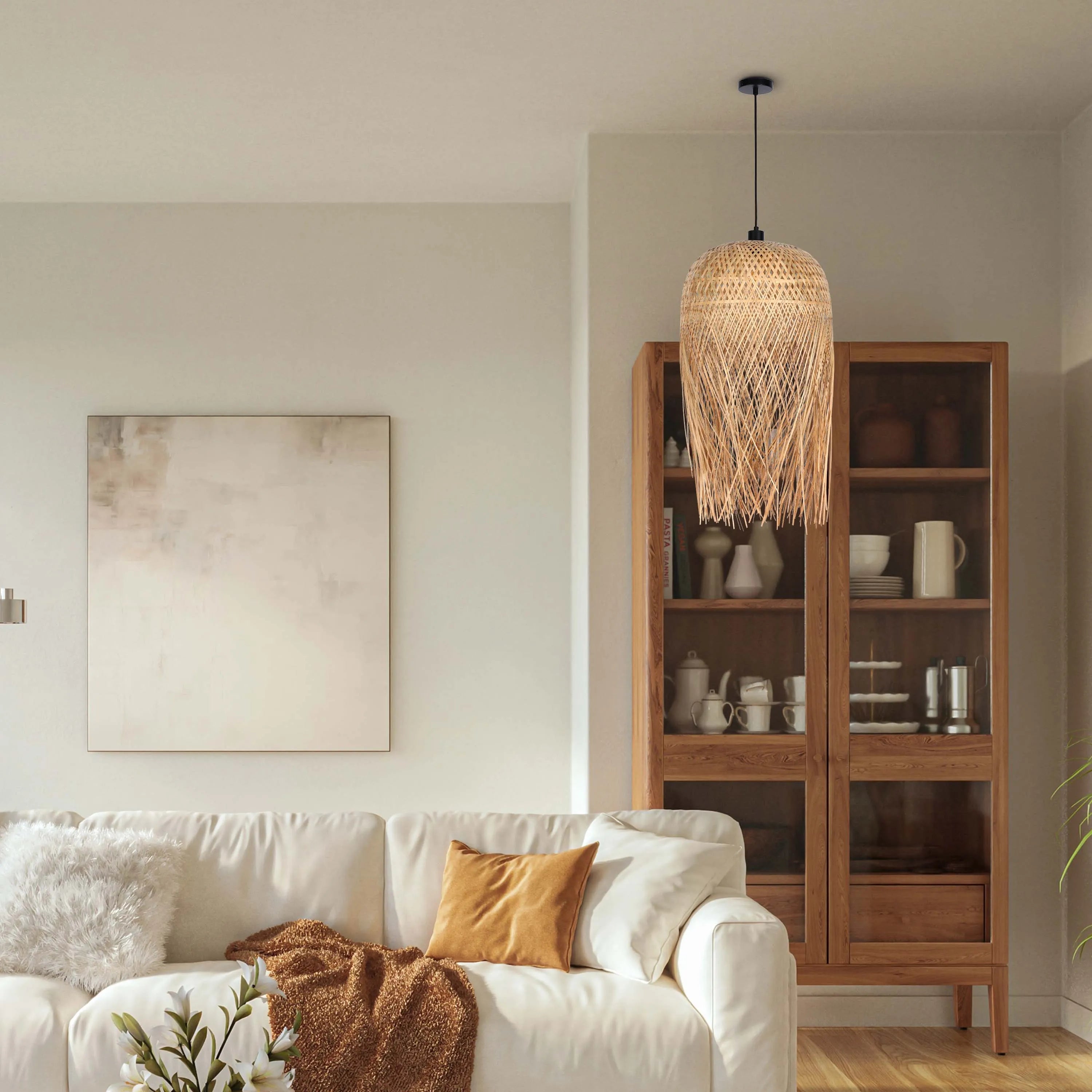 A woven pendant light illuminates a neutral living space, complementing the warm wooden cabinet and inviting sofa.