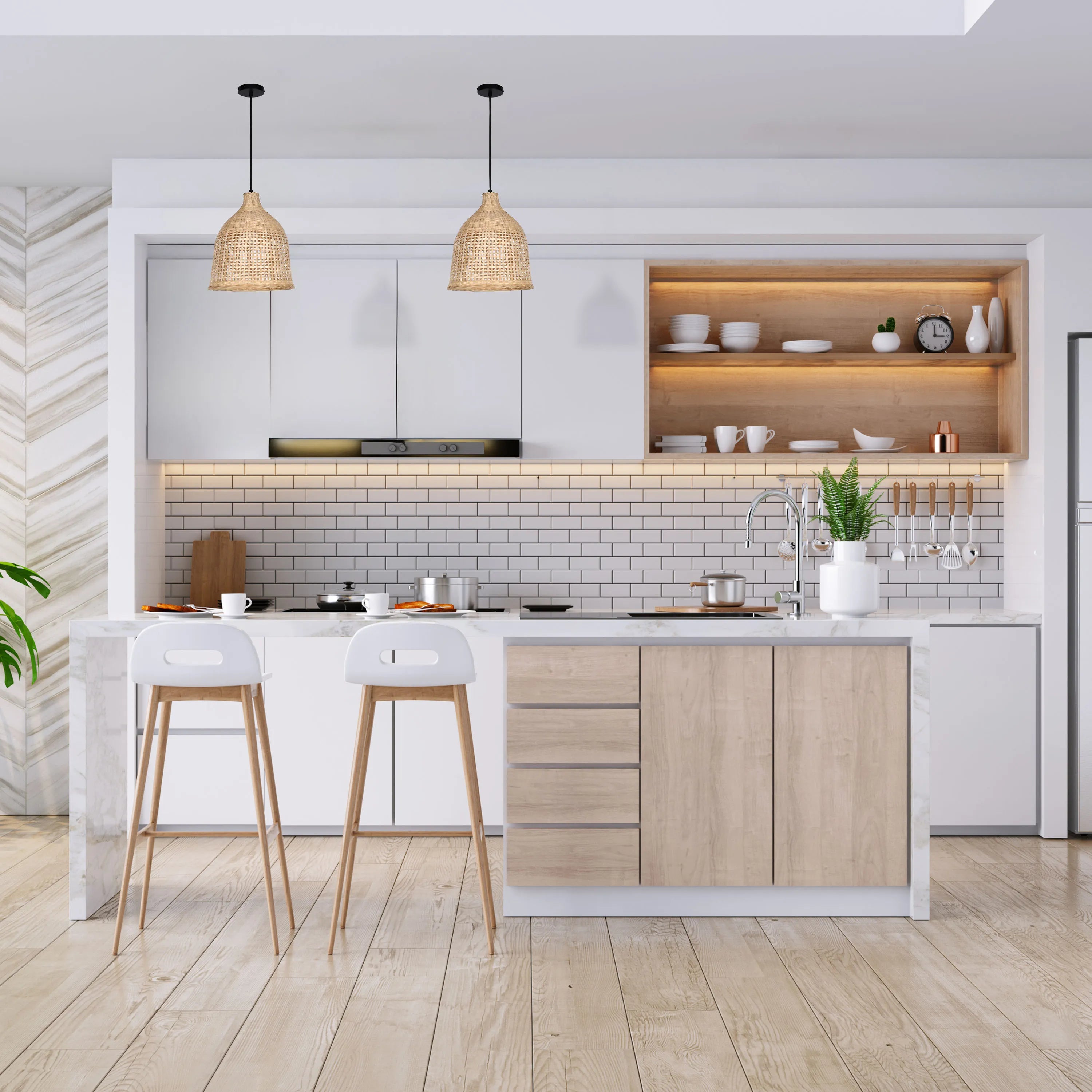 Contemporary kitchen with two pendant lights hanging above the kitchen island, providing warm and stylish illumination to the space.