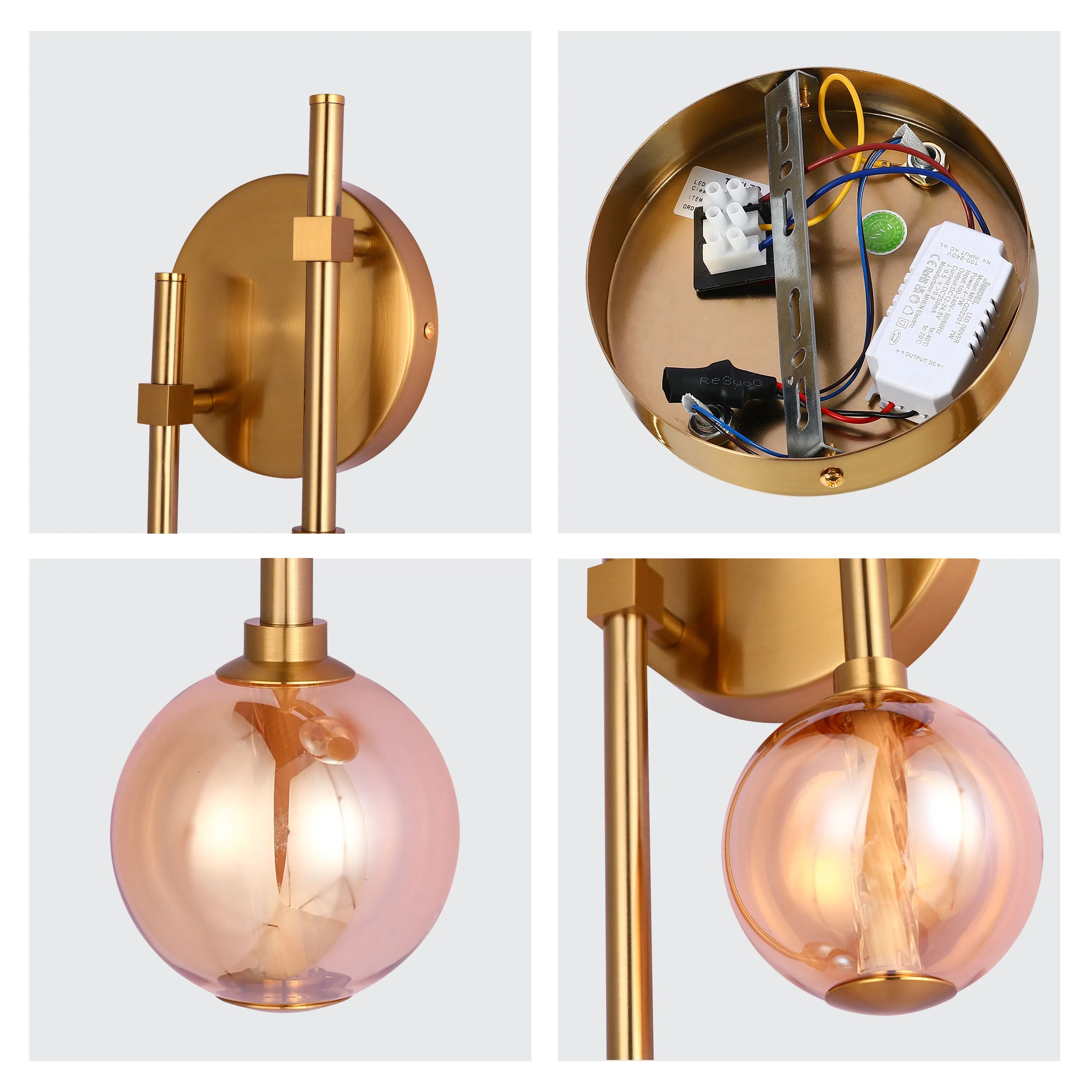 A modern wall light with a gold finish and an amber glass globe. It has a sleek, minimalist design.