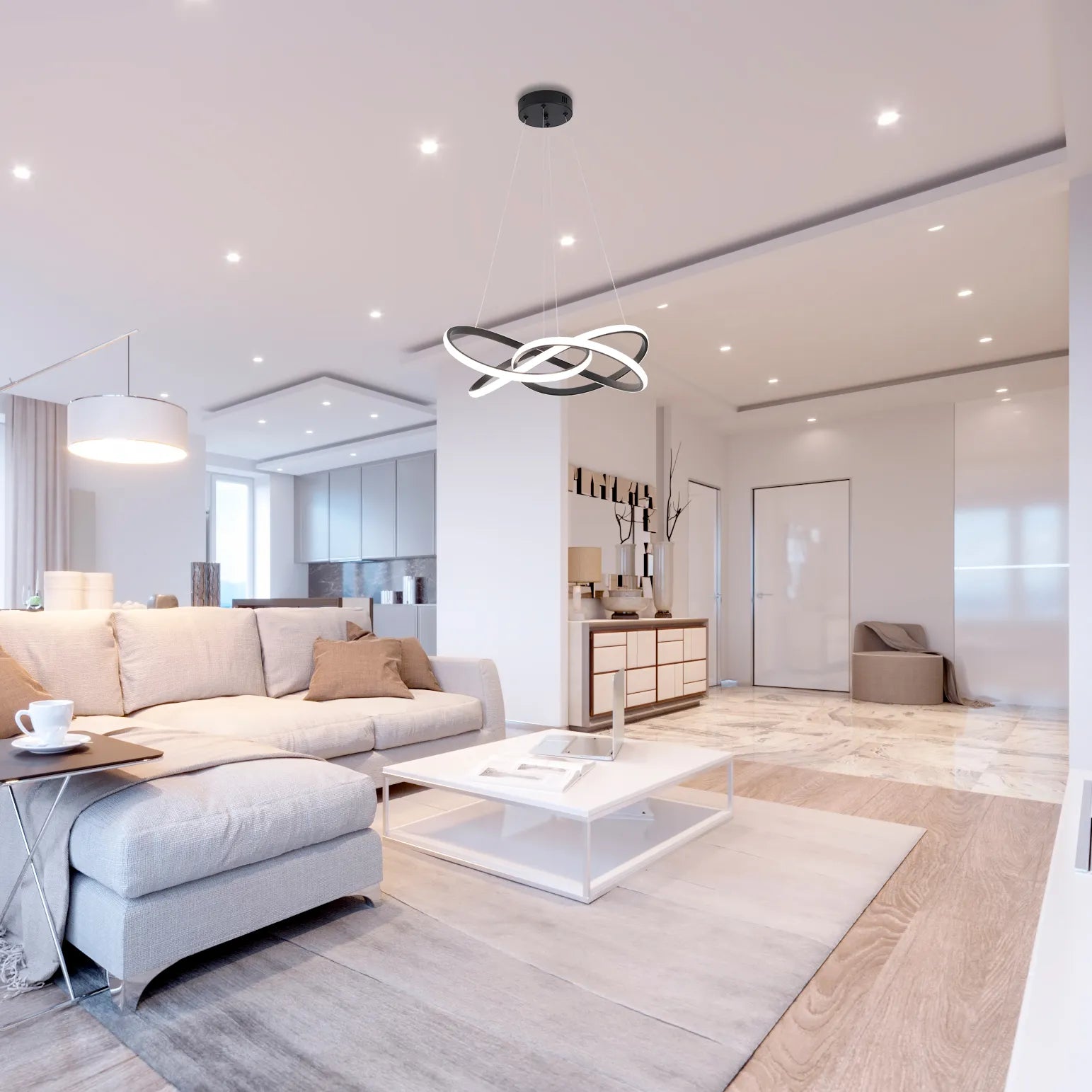 Contemporary living room showcasing a sculptural, ring-shaped pendant light, plus recessed ceiling lights.