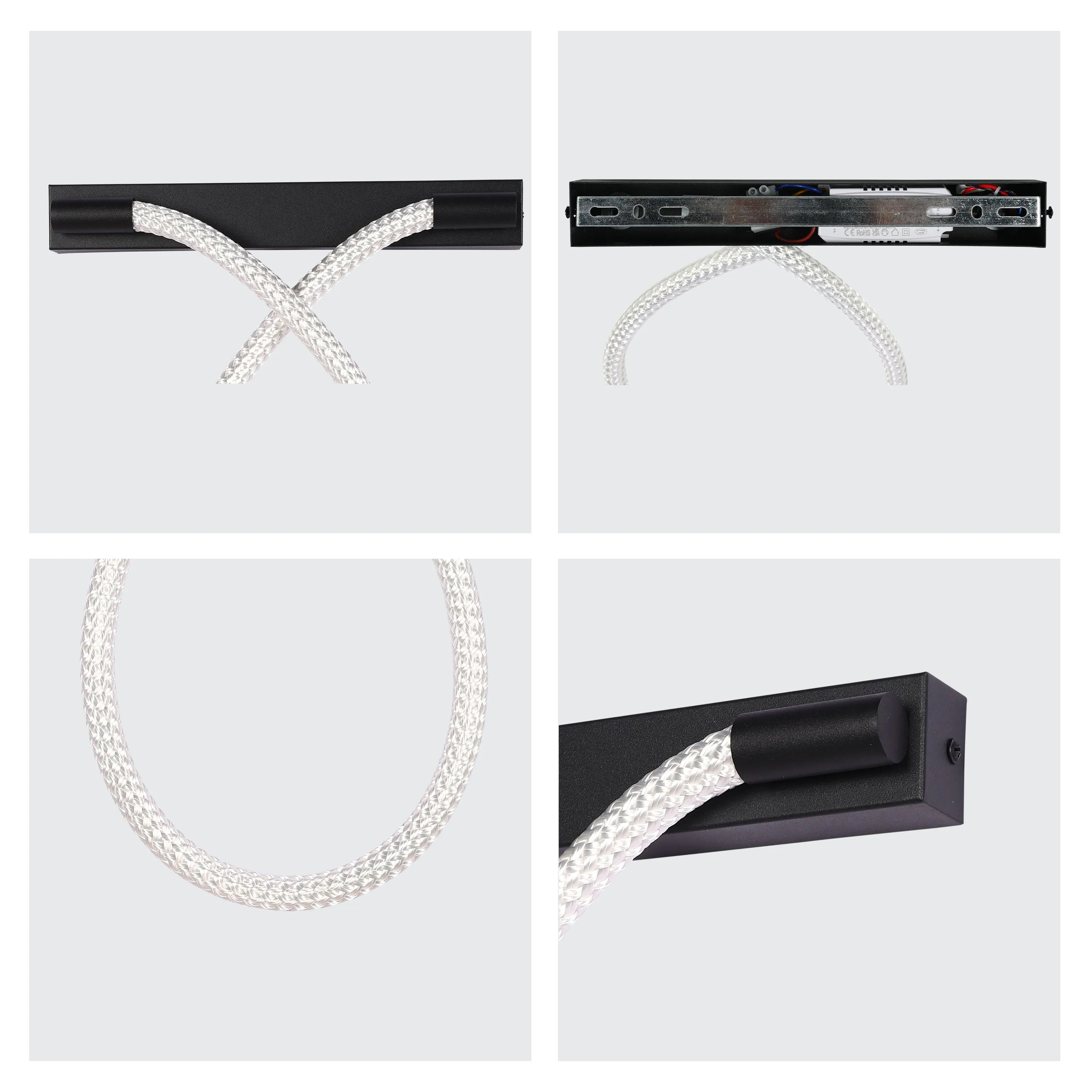 Modern wall light with a black bar and a flexible, white, braided cord forming a stylish, looped design.