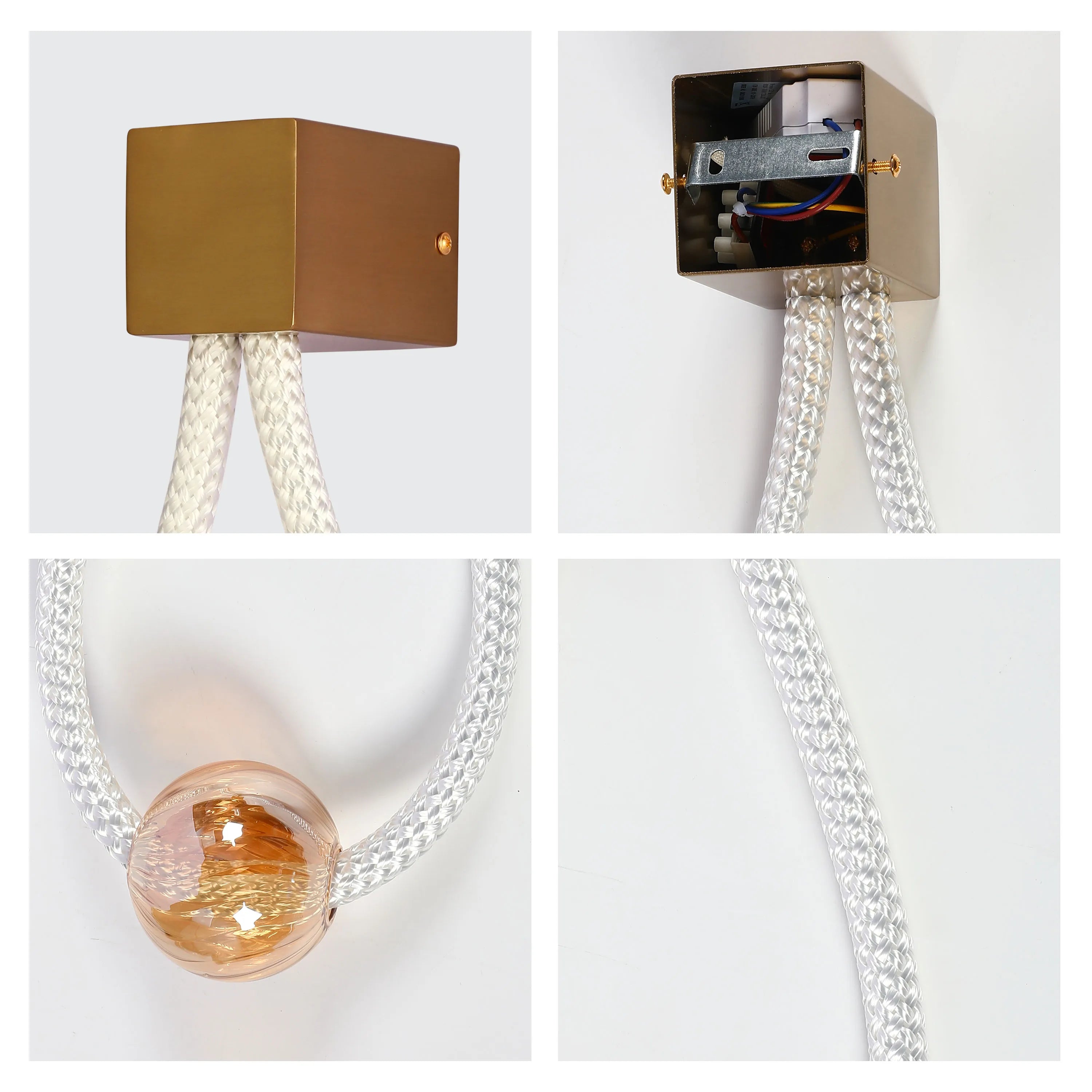 A modern ceiling light with a square brass fitting, white braided rope cables, and a decorative amber glass sphere.