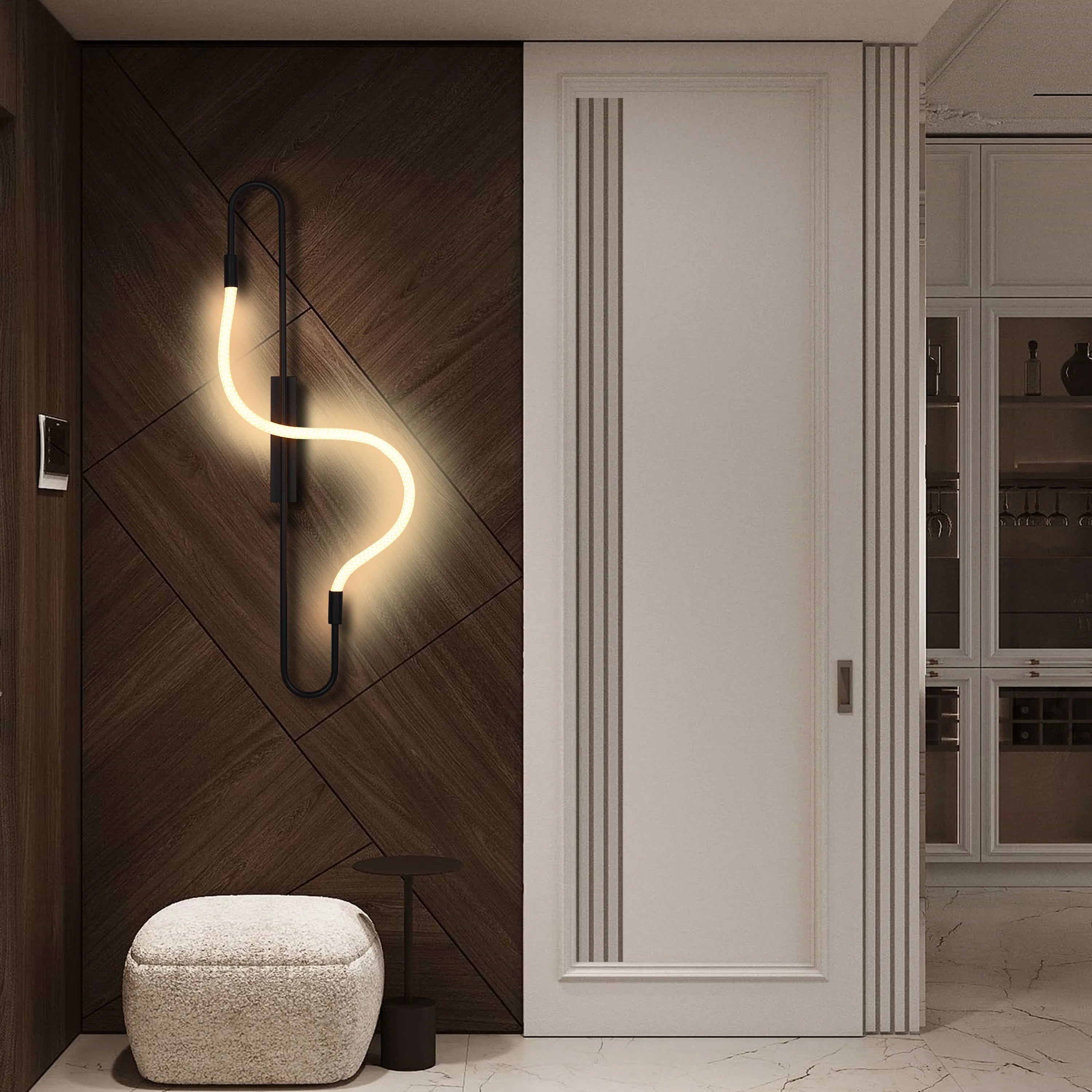 A modern wall sconce with a curved, neon-style light, creating a soft, ambient glow on a dark wood-panelled wall.