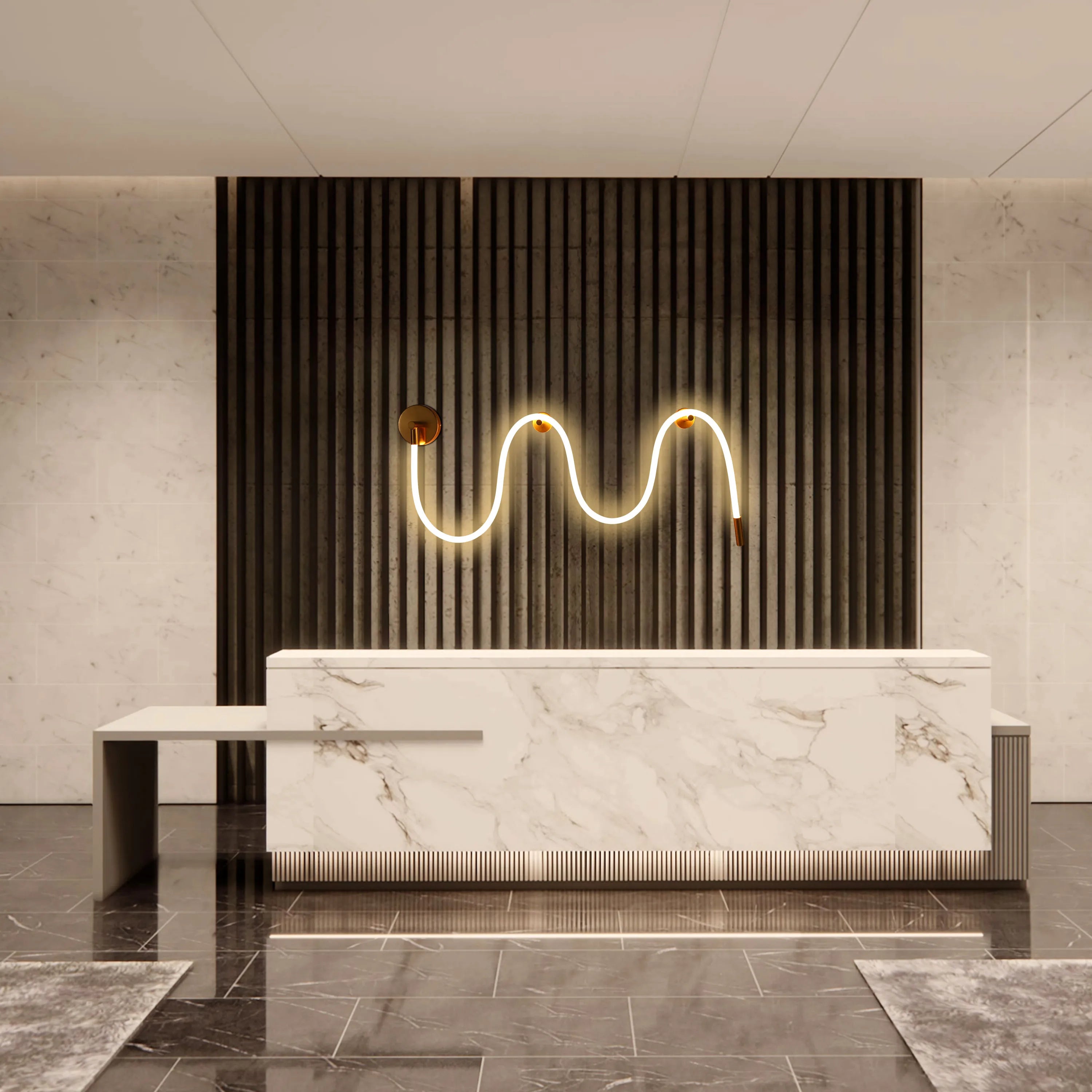 Stylish reception area with a wavy, warm light feature and marble countertop, creating a modern, inviting ambience.