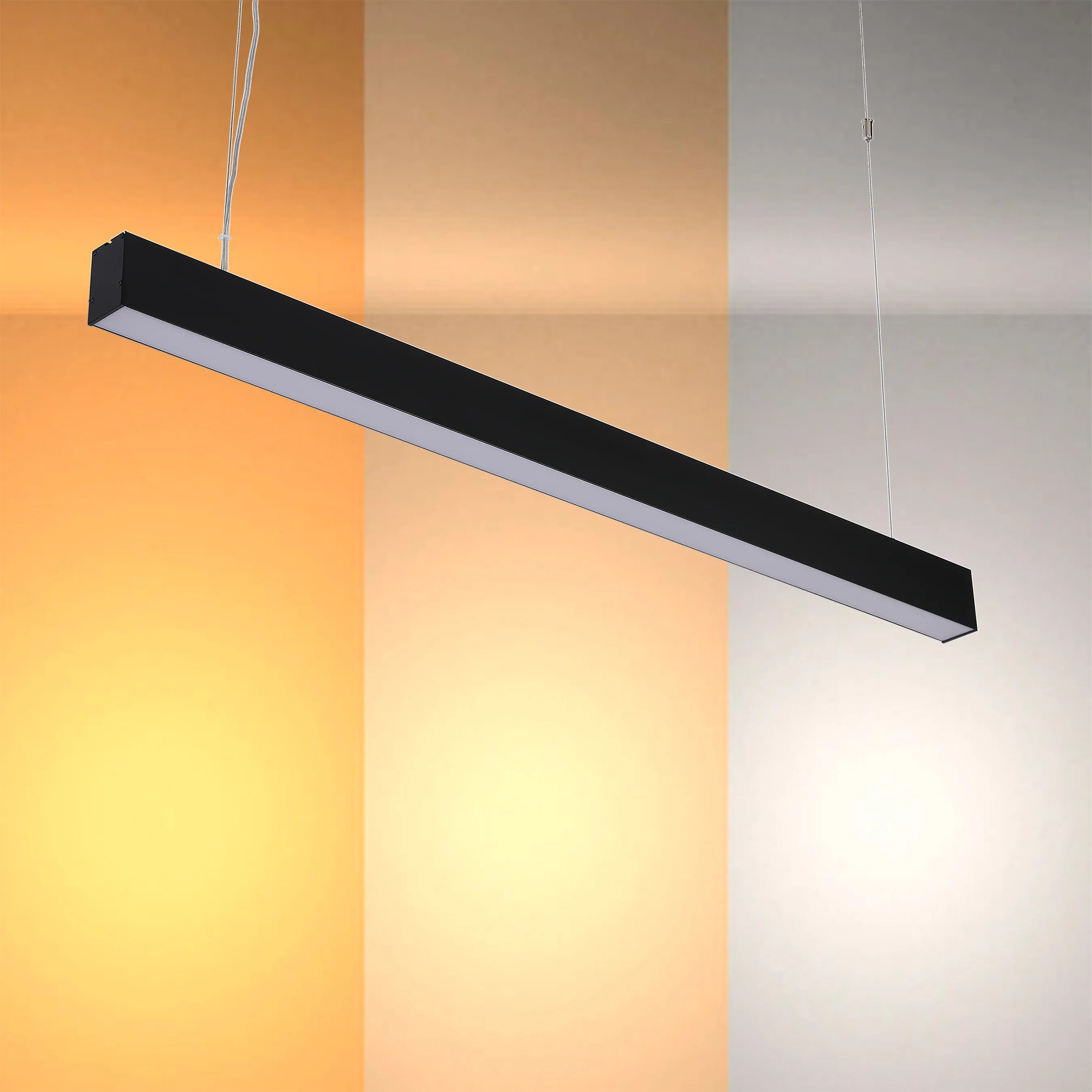 Contemporary suspended LED light, offering warm to cool illumination. Sleek black design, modern lighting fixture.
