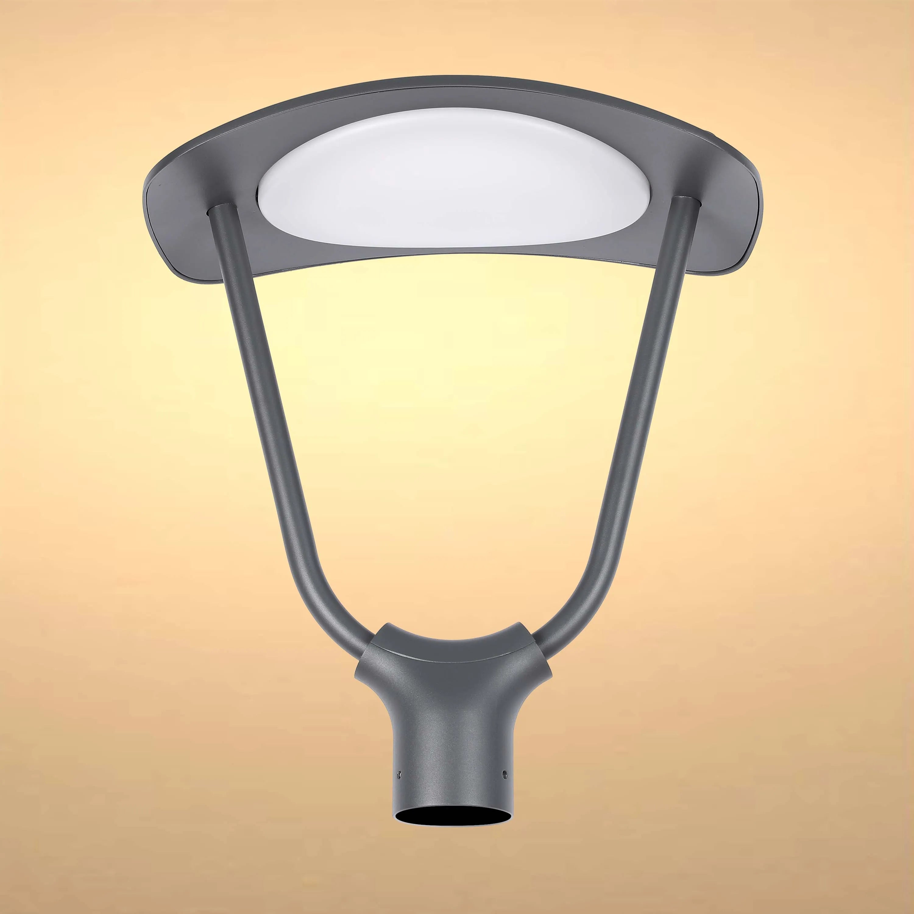 A stylish, modern grey outdoor light fixture with a circular white shade, emanating a soft, ambient glow.