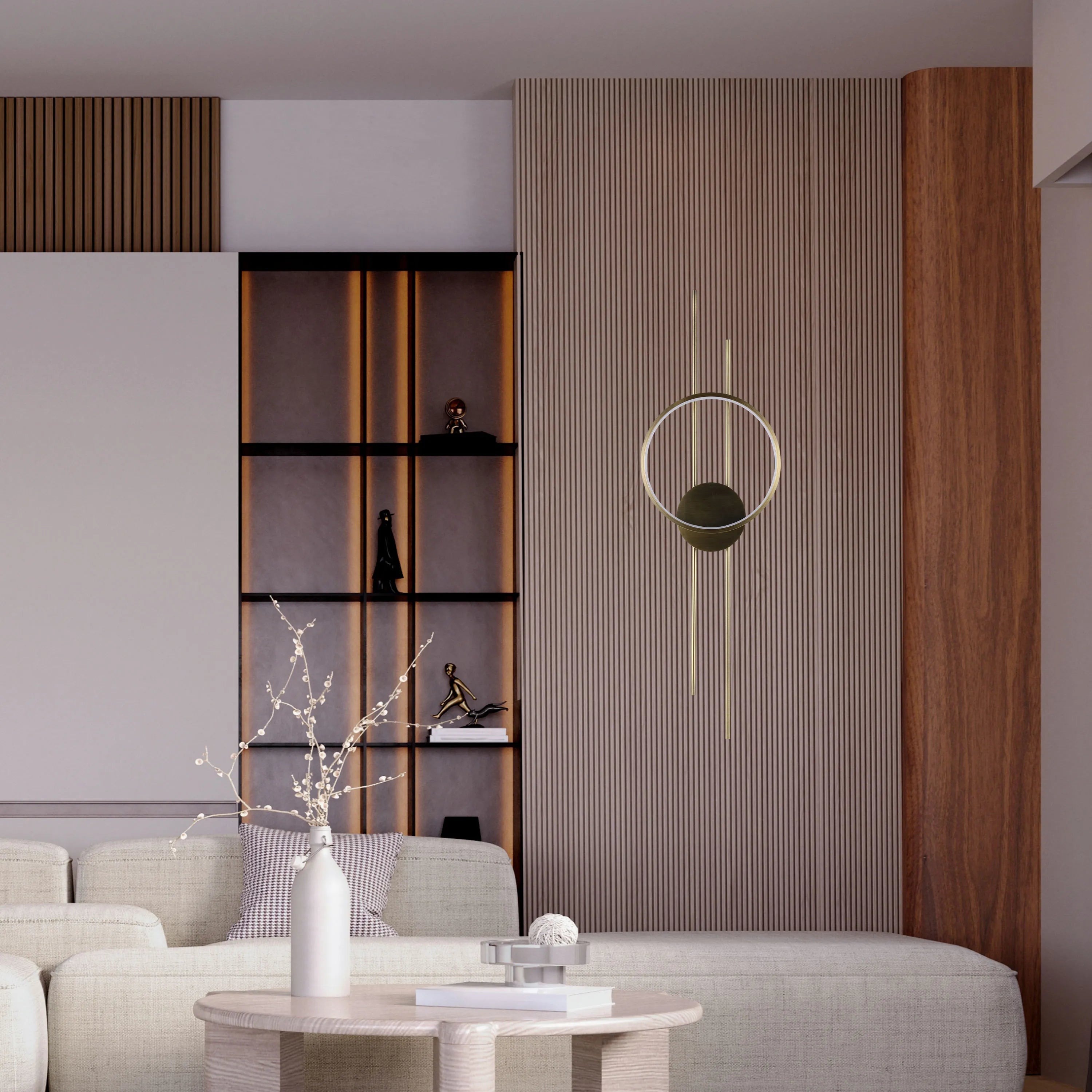 Ambient interior lighting. A feature wall with built in shelving and a minimalist gold circular wall light.