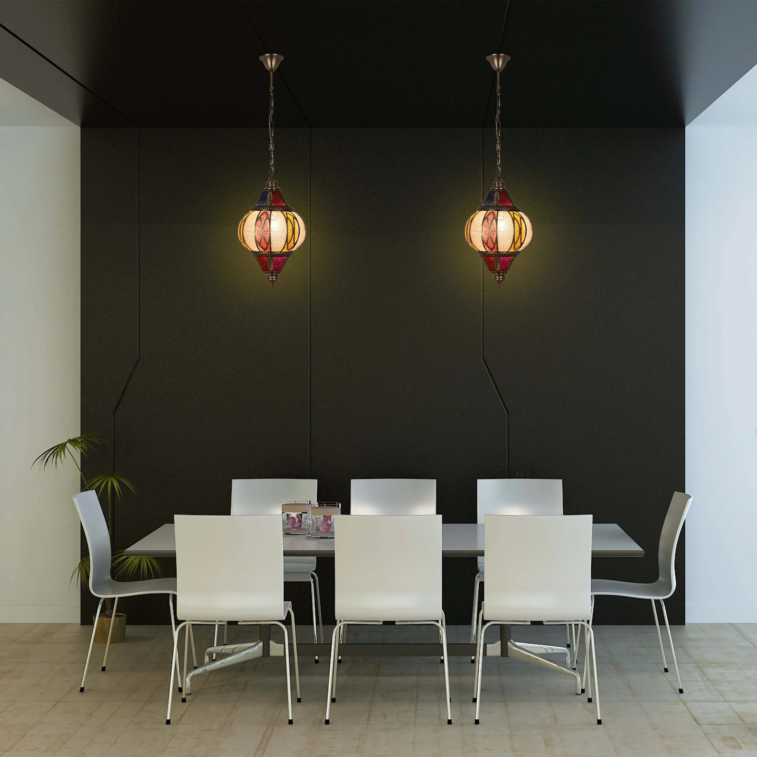 Two hanging pendant lights illuminate the dining table, providing a warm and inviting ambience.