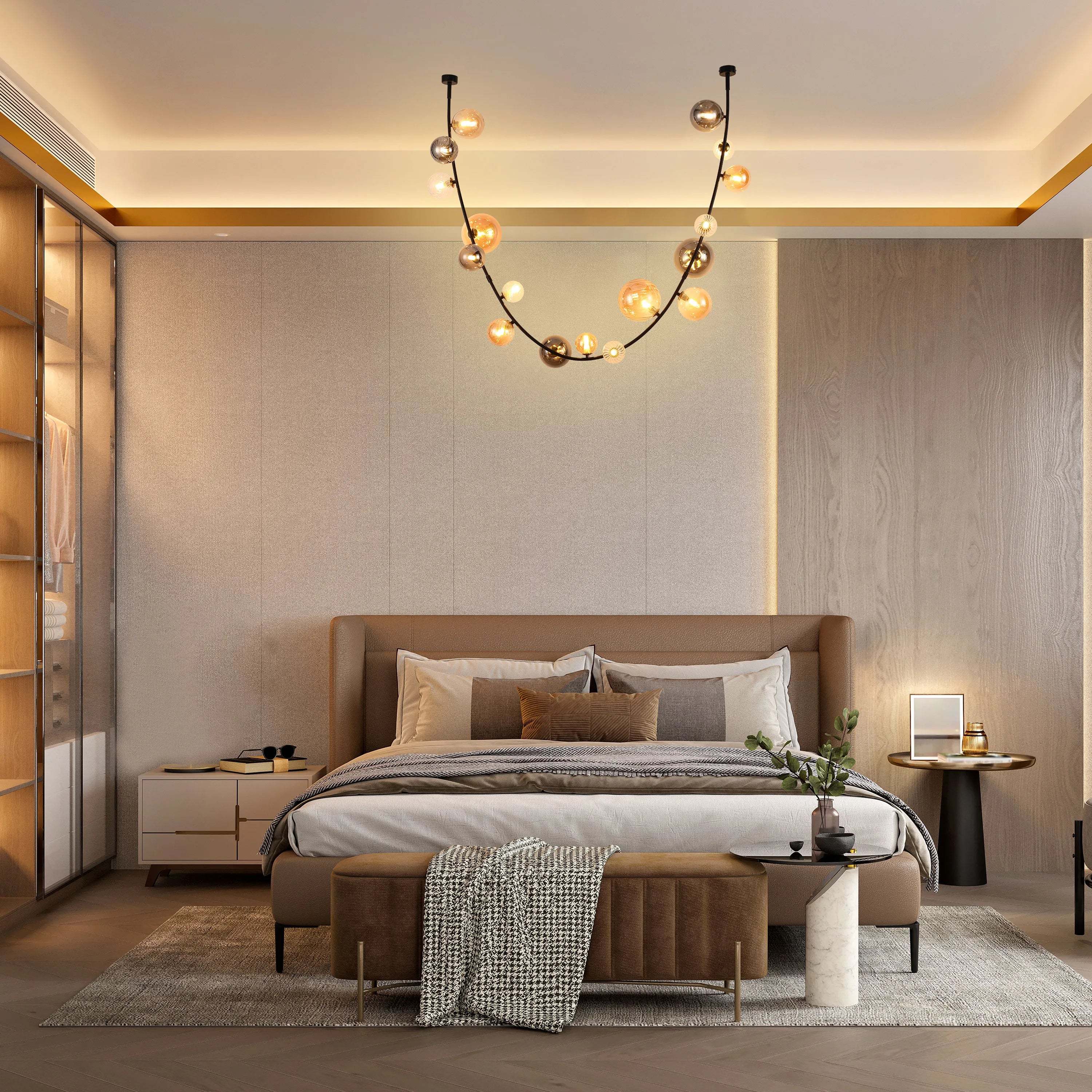 A statement bubble chandelier emits a warm glow. Integrated wall lighting adds a soft ambience to this modern bedroom.