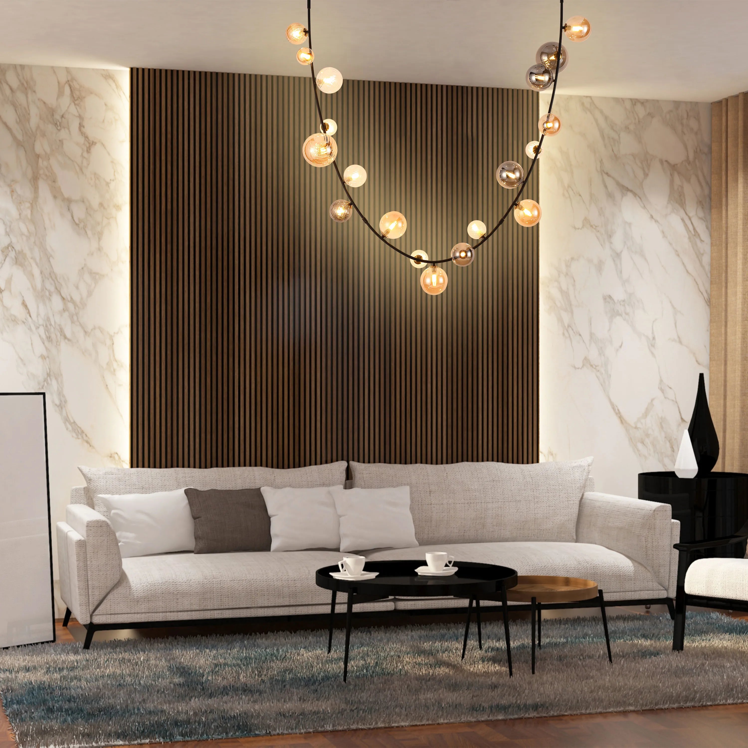Eye-catching, contemporary lighting fixture with multiple warm-toned glass globes hanging above a stylish living room.