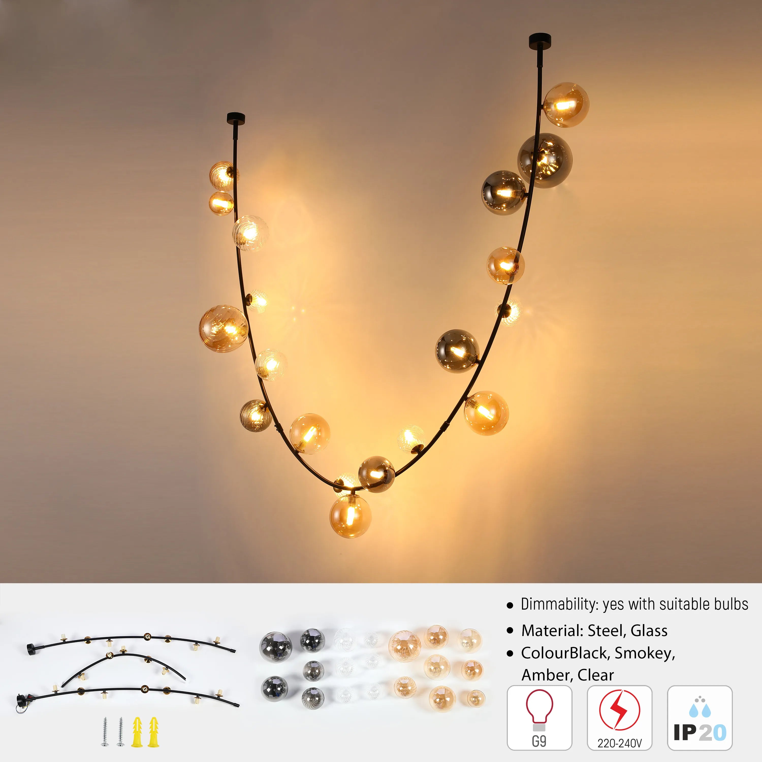 Statement pendant light with multiple glass orbs in smokey, amber and clear colours. Black steel frame.