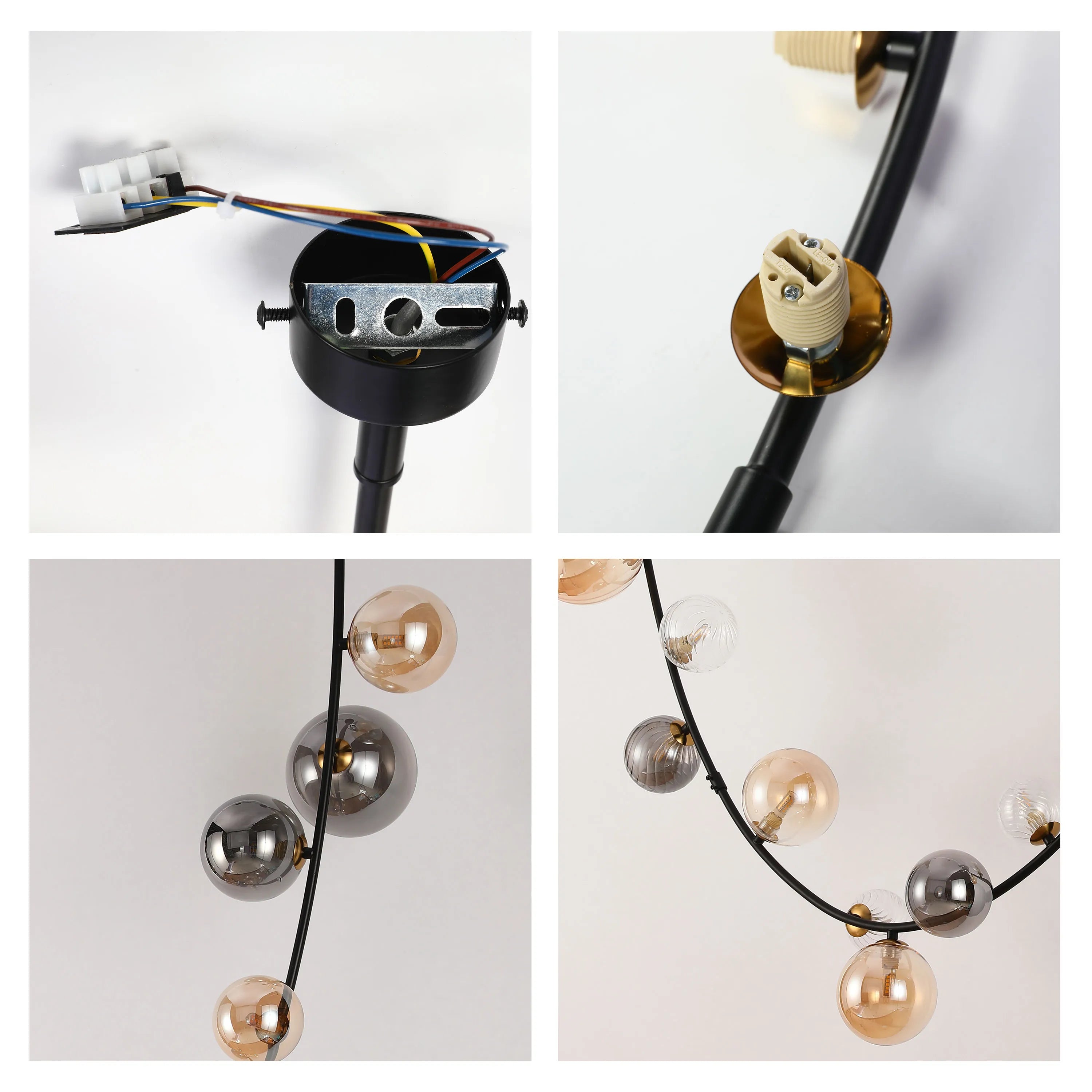 A modern chandelier featuring a black metal frame with glass globe shades in varying colours and textures.