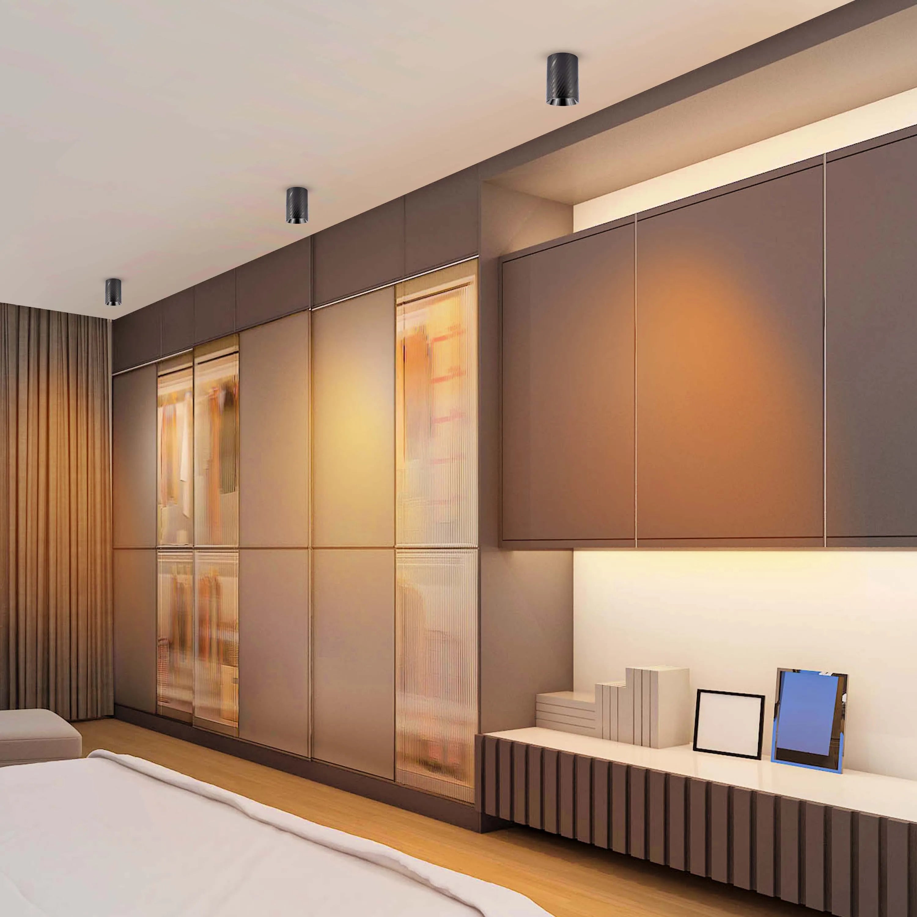 Modern bedroom with recessed ceiling lights, ambient shelf lighting & semi-transparent wardrobe doors.