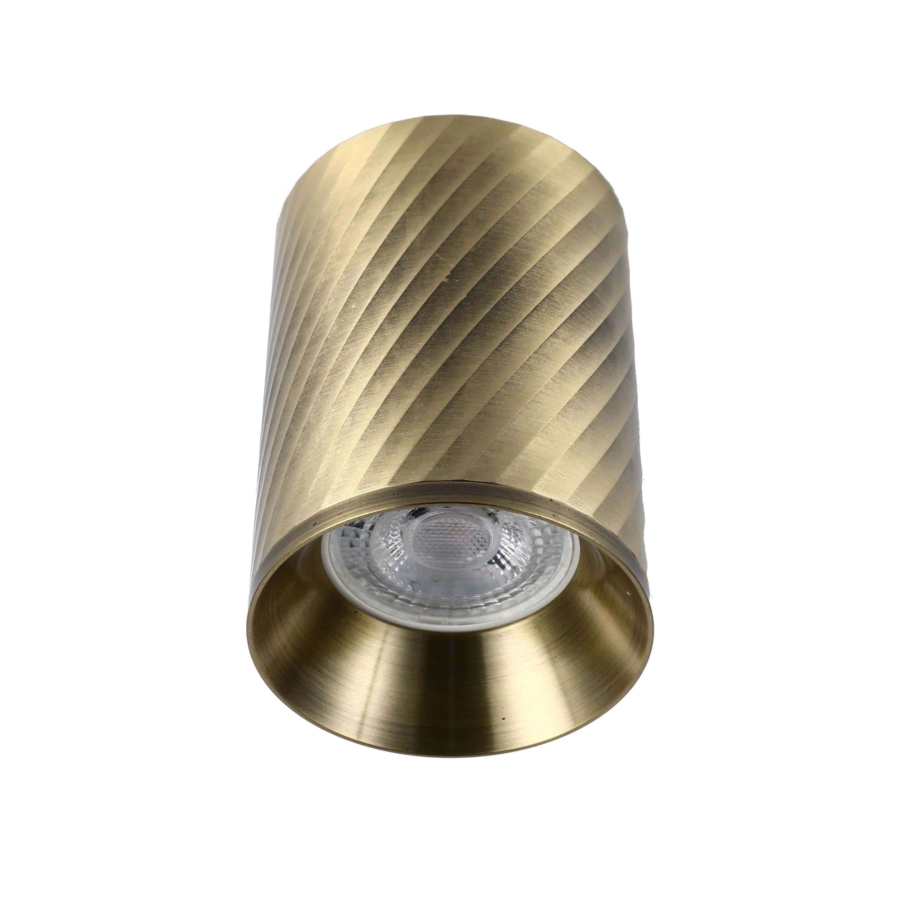Stylish gold cylindrical downlight with a textured twist design. A modern fitting for adding character to any space.