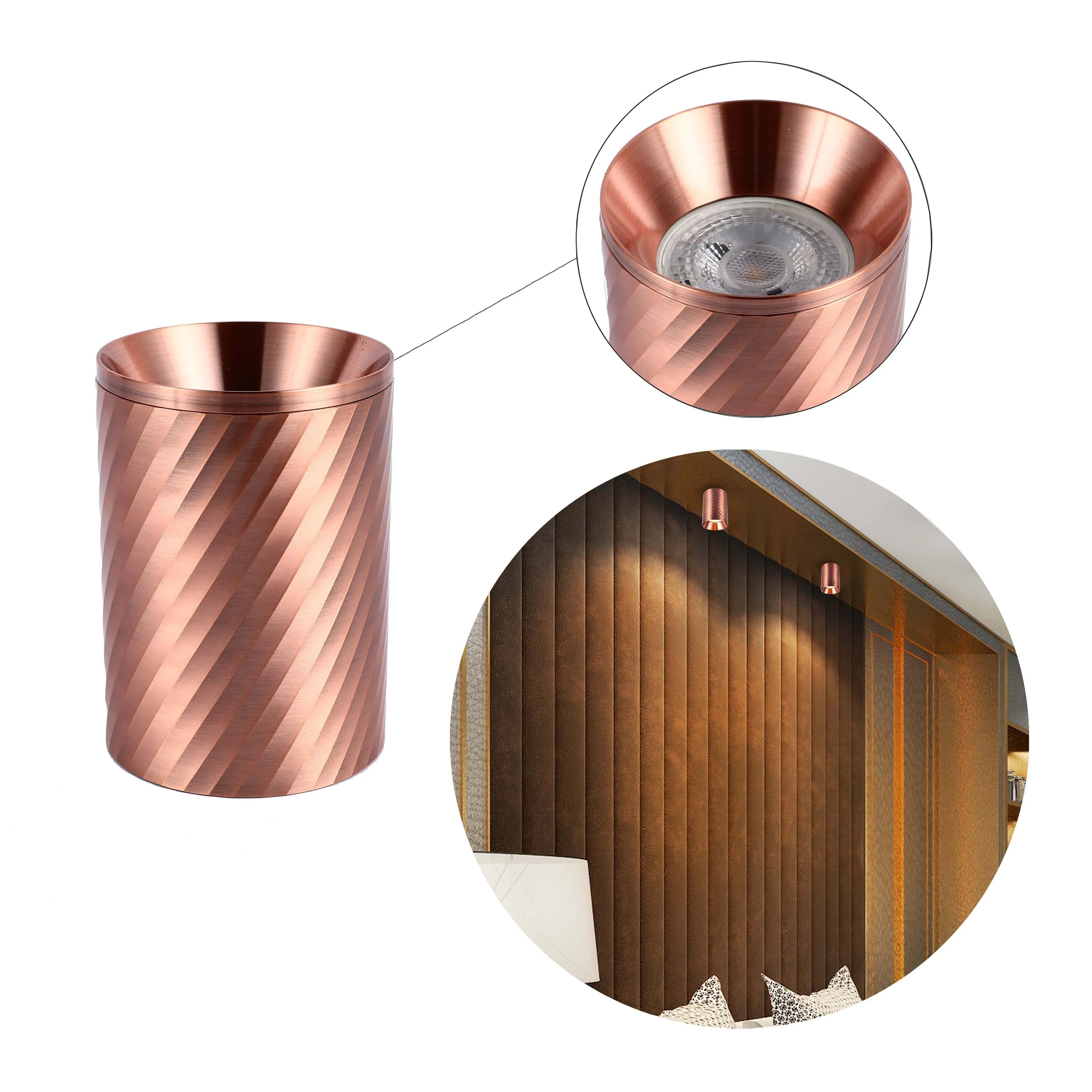 Modern copper cylinder wall lights, spotlighting the room. Stylish & energy efficient lighting solutions for the modern home.